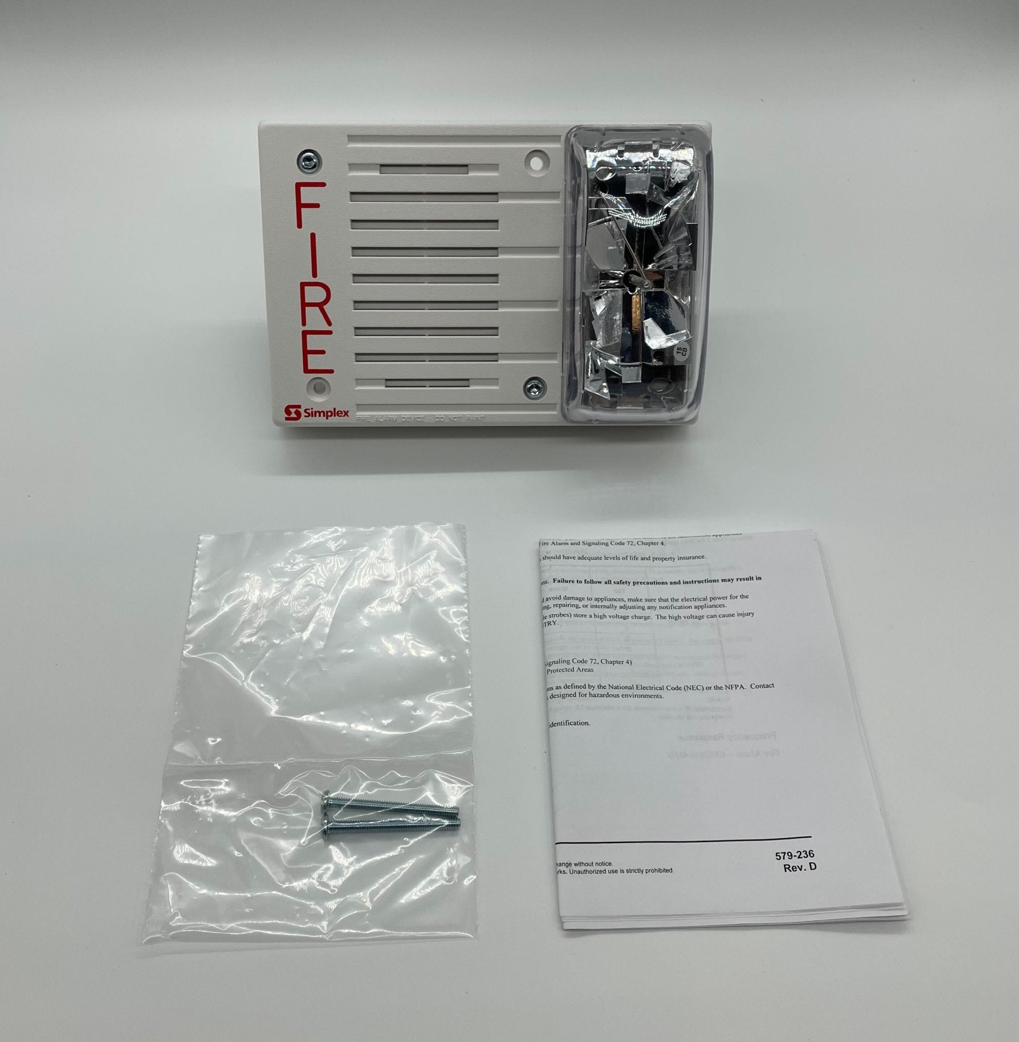 Simplex 4903-9193 speaker strobe alarm with red housing and clear lens, designed for fire safety and emergency alert systems.