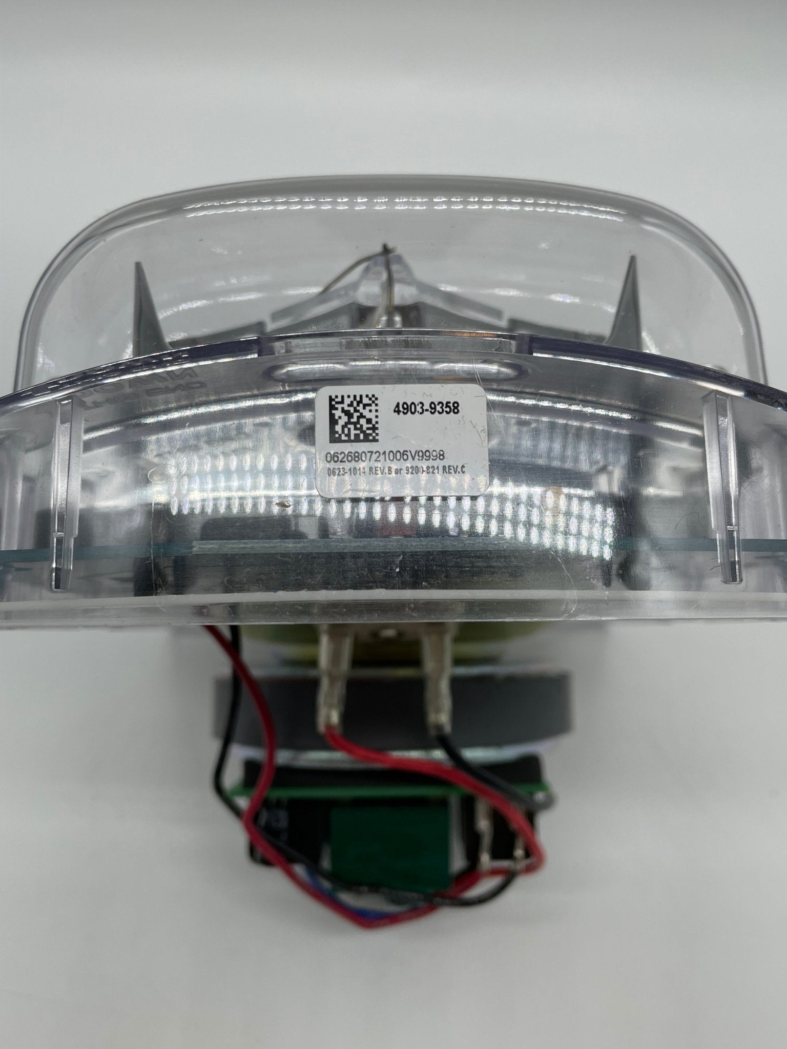 Simplex 4903-9358 speaker strobe alarm with red housing and mounting bracket for fire safety alert system.