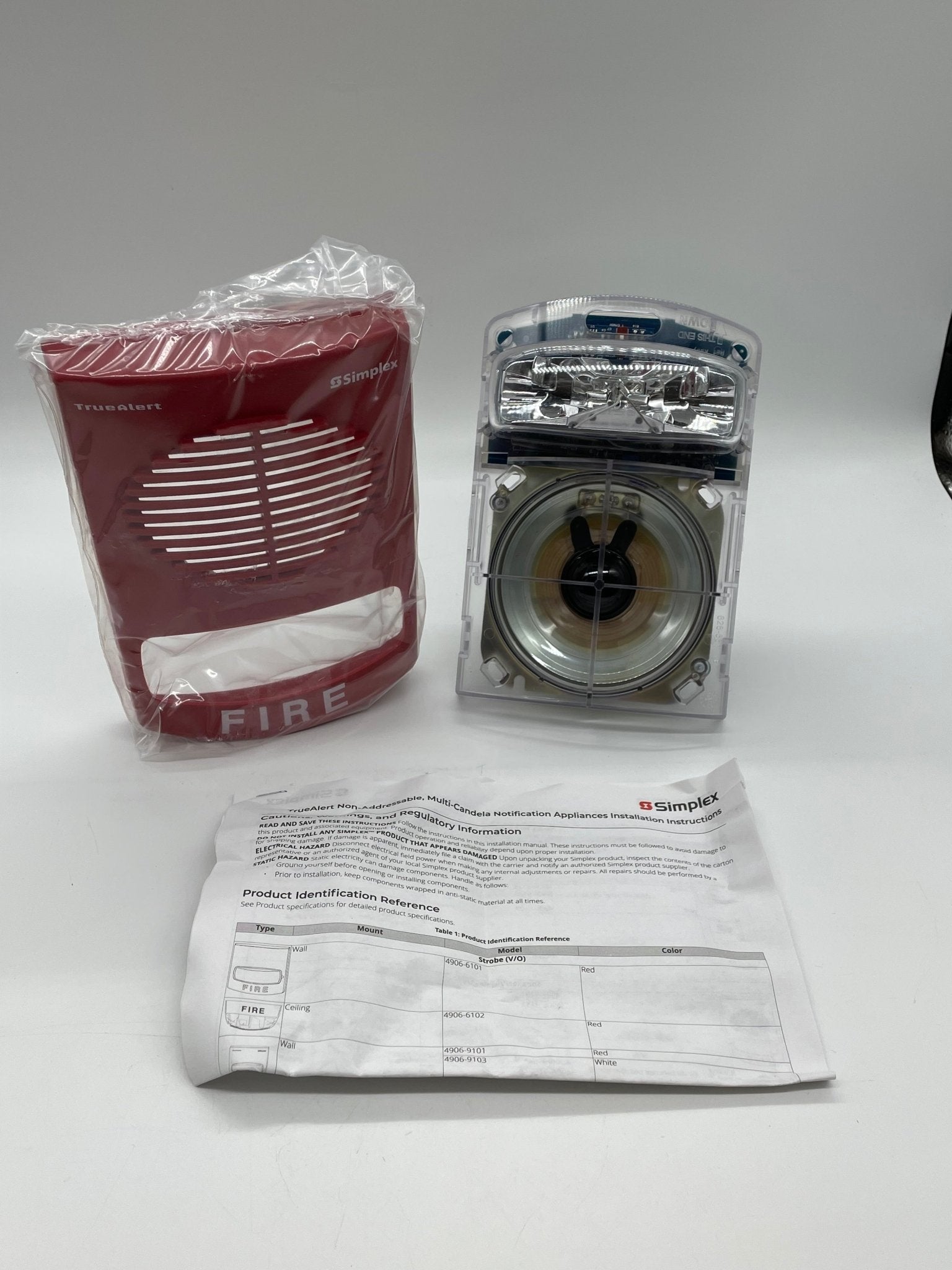 Simplex 4903-9358 speaker strobe alarm with red cover and mounting base, designed for fire safety and emergency notification systems.