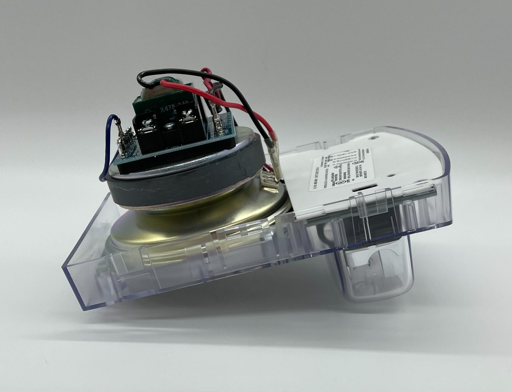 Simplex 4903-9361 speaker strobe alarm device with bright red housing and mounting bracket showing in the image.