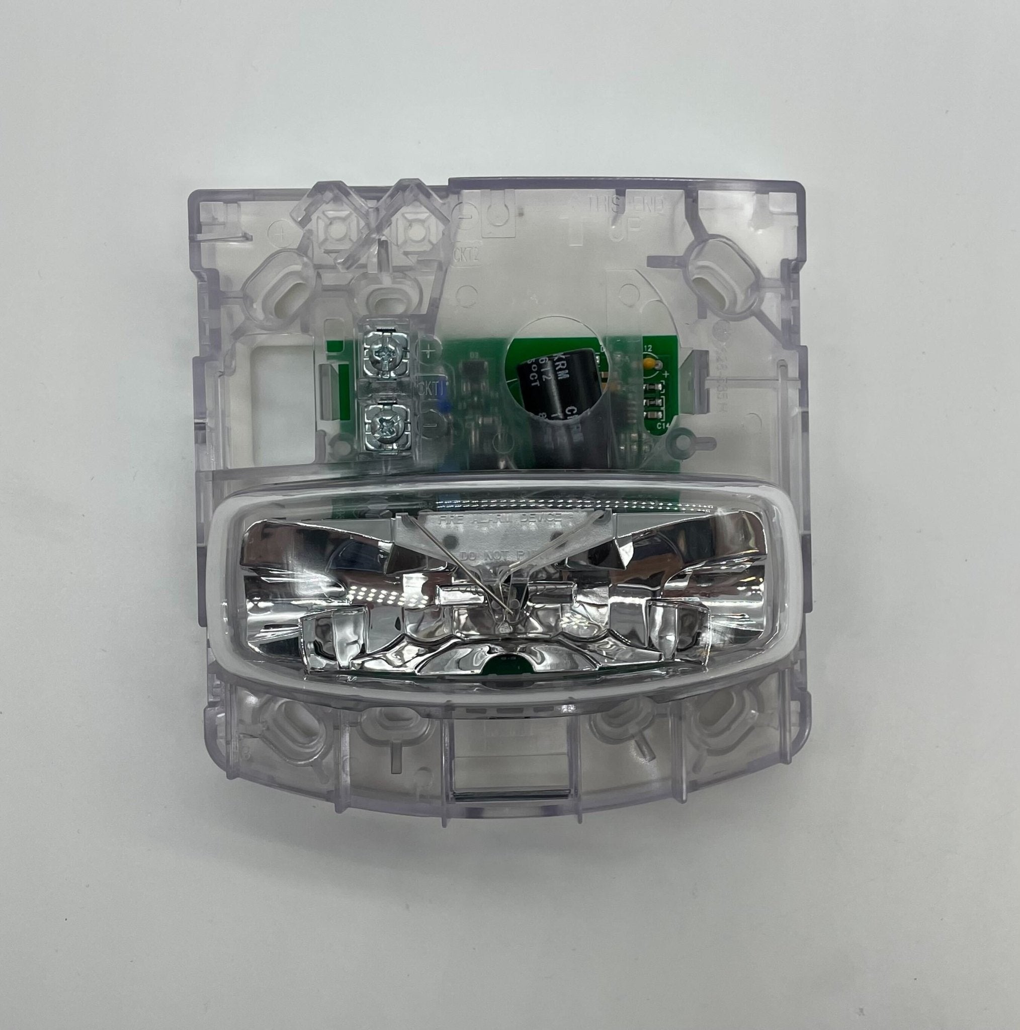 Simplex 4904-9170 strobe light with clear casing and mounting bracket, designed for emergency signaling and fire alarm systems.