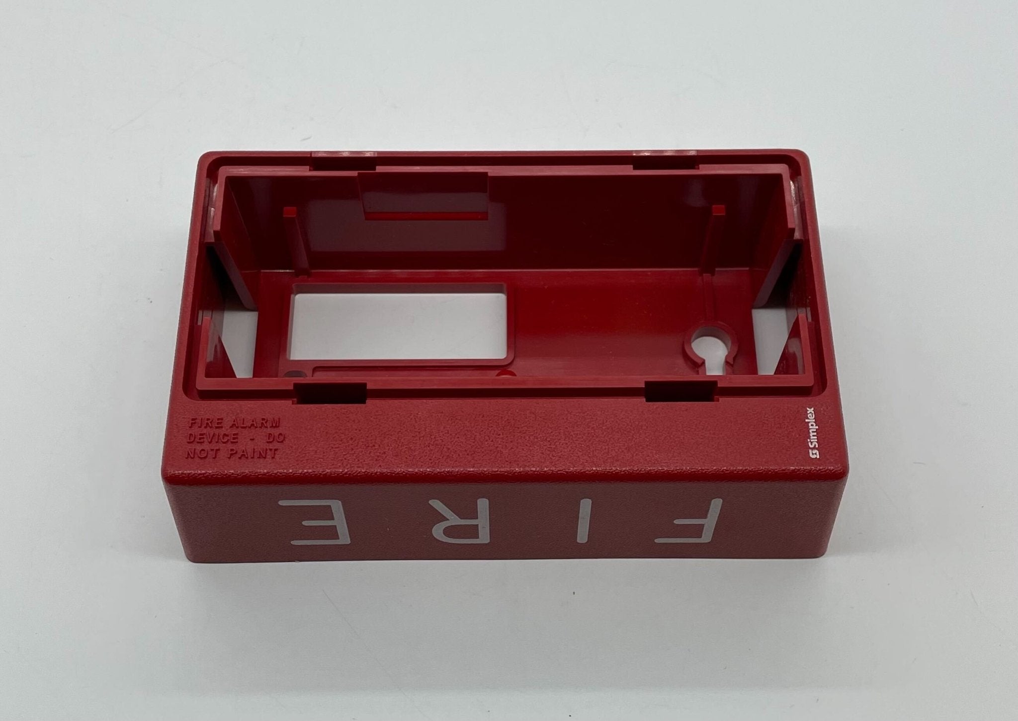 Simplex 4904-9184 fire alarm device with alarm indicator and wiring for building safety system.