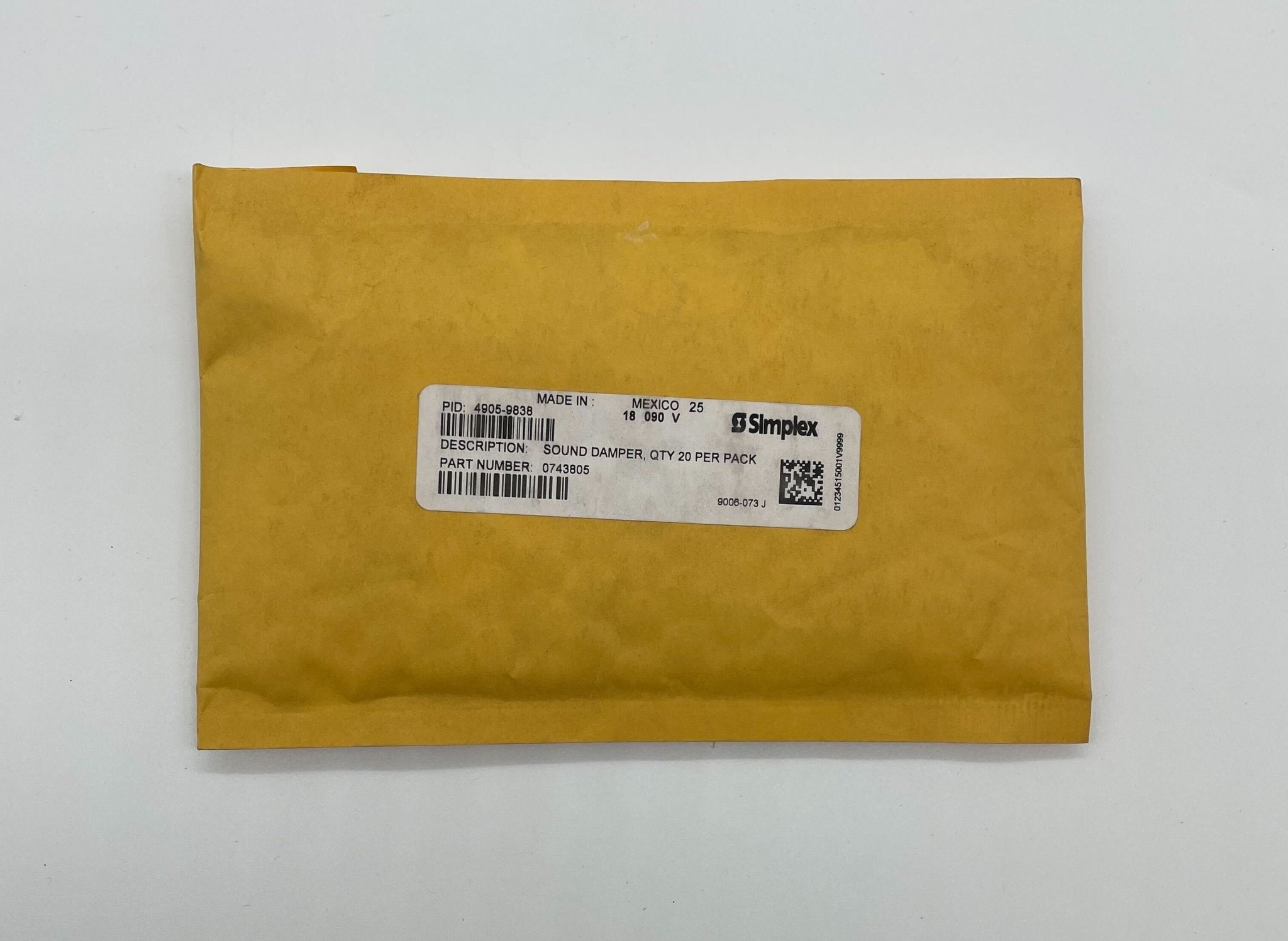 Simplex 4905-9838 fire alarm with white plastic case and mounting bracket, designed for building safety and fire detection.