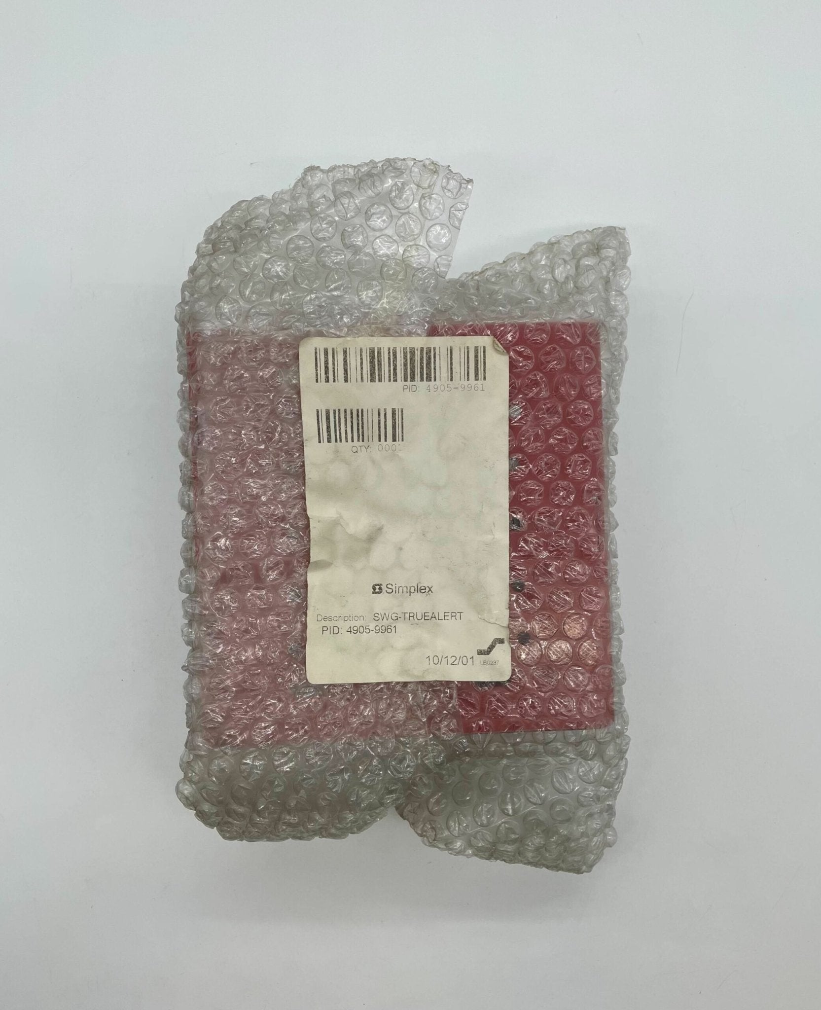 Simplex 4905-9961 fire alarm, white wall-mounted safety device from Simplex brand, with test and alarm indicator lights.
