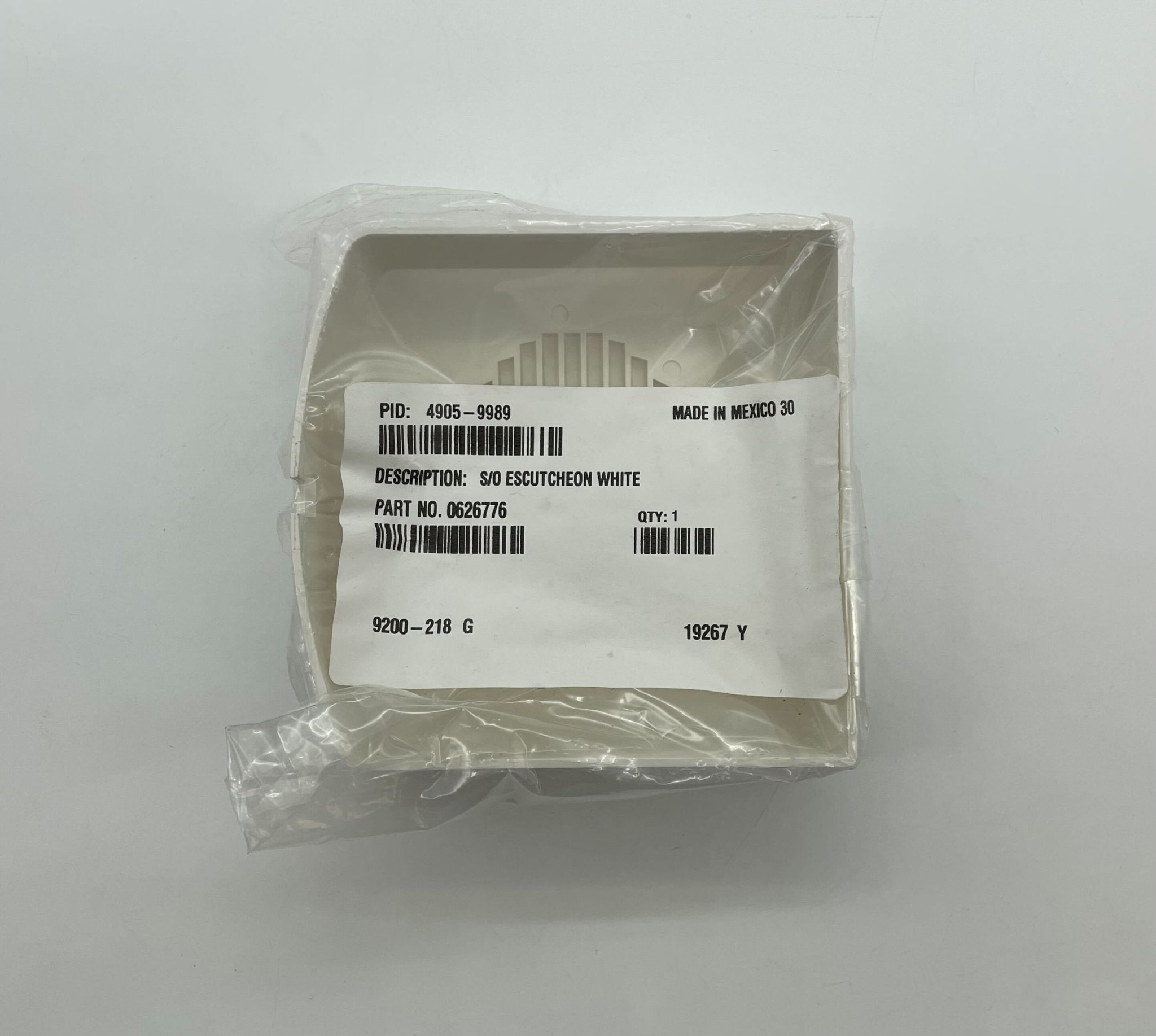 Simplex 4905-9989 cover for fire alarm system, black plastic exterior, designed for easy installation and protection.