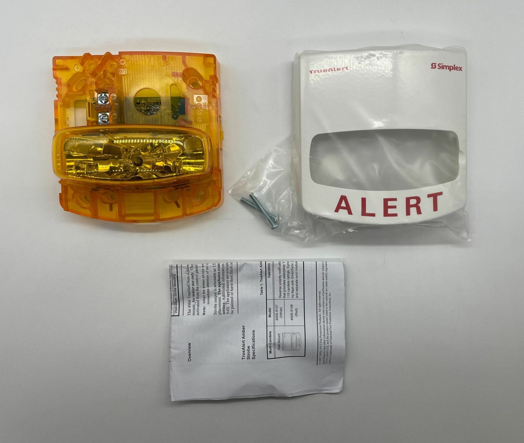 Simplex 4906-9107 fire alarm device with white plastic casing and mounting bracket, designed for building safety systems