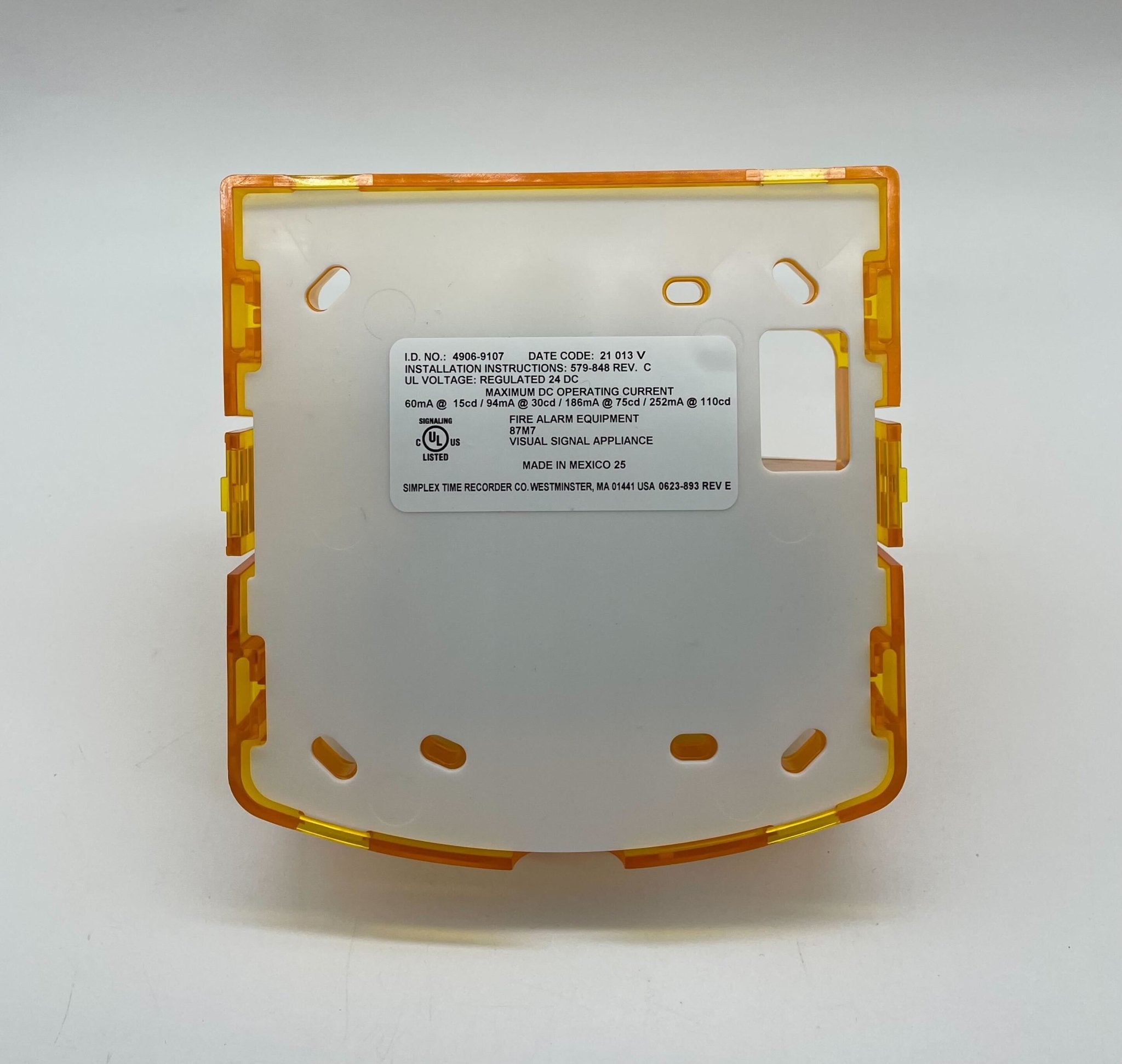 Simplex 4906-9107 fire alarm device mounted on a wall, part of the Simplex fire alarm system for safety and detection.