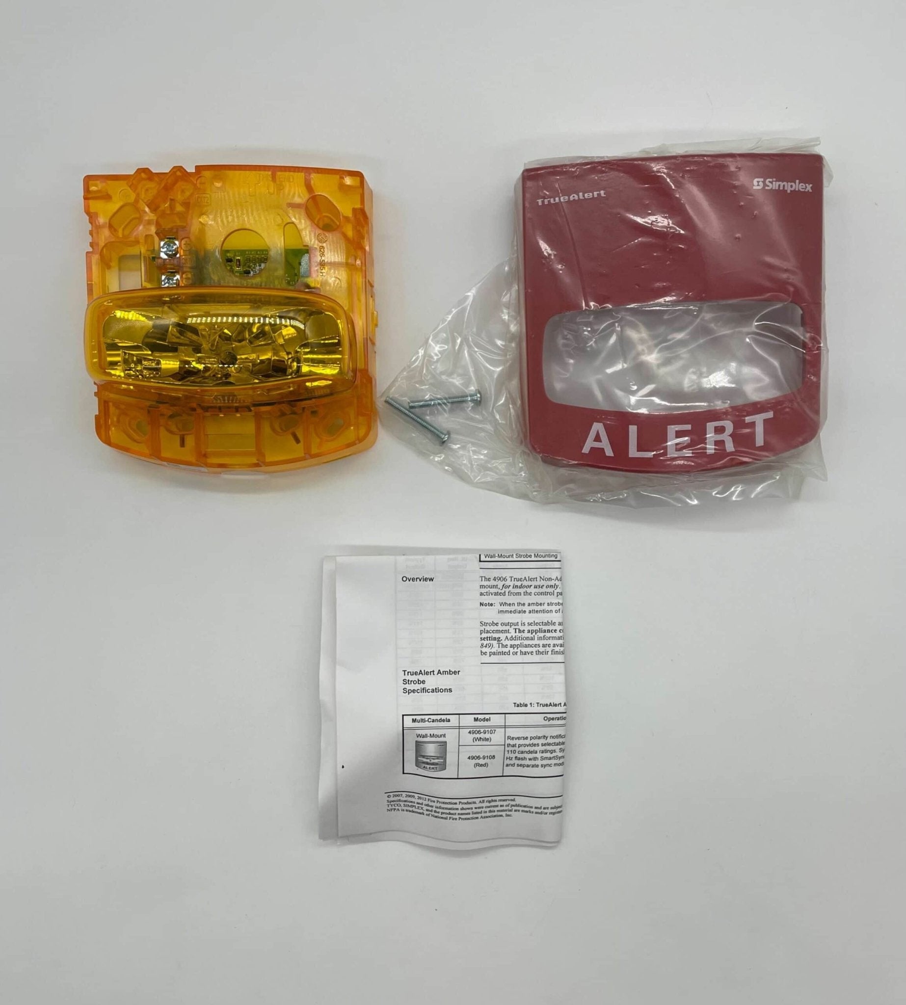 Simplex 4906-9108 fire alarm with a white plastic casing and mounting bracket, designed for fire detection and safety.