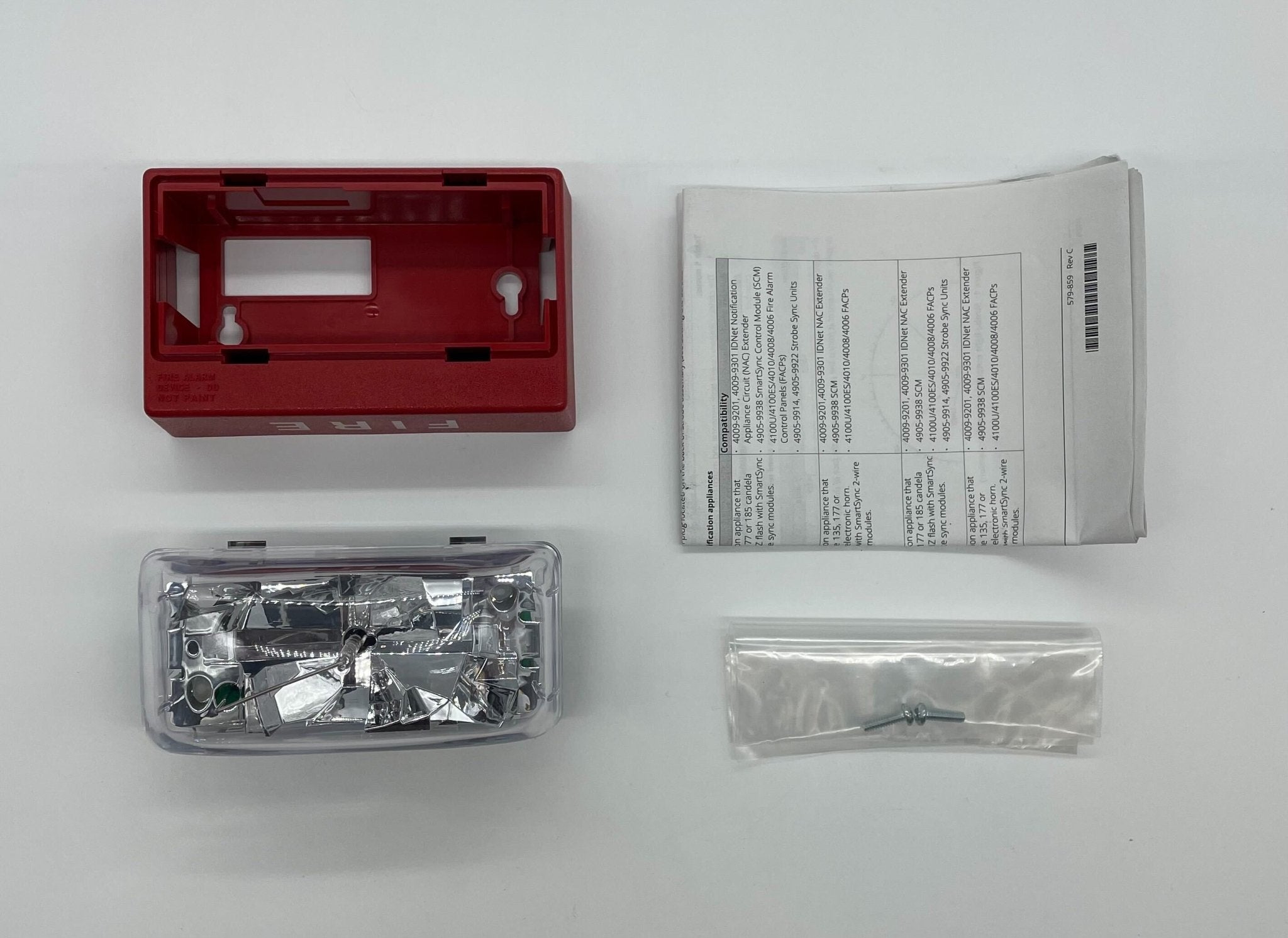 Simplex 4906-9110 fire alarm with white casing and mounting bracket, designed for building safety and emergency notification.