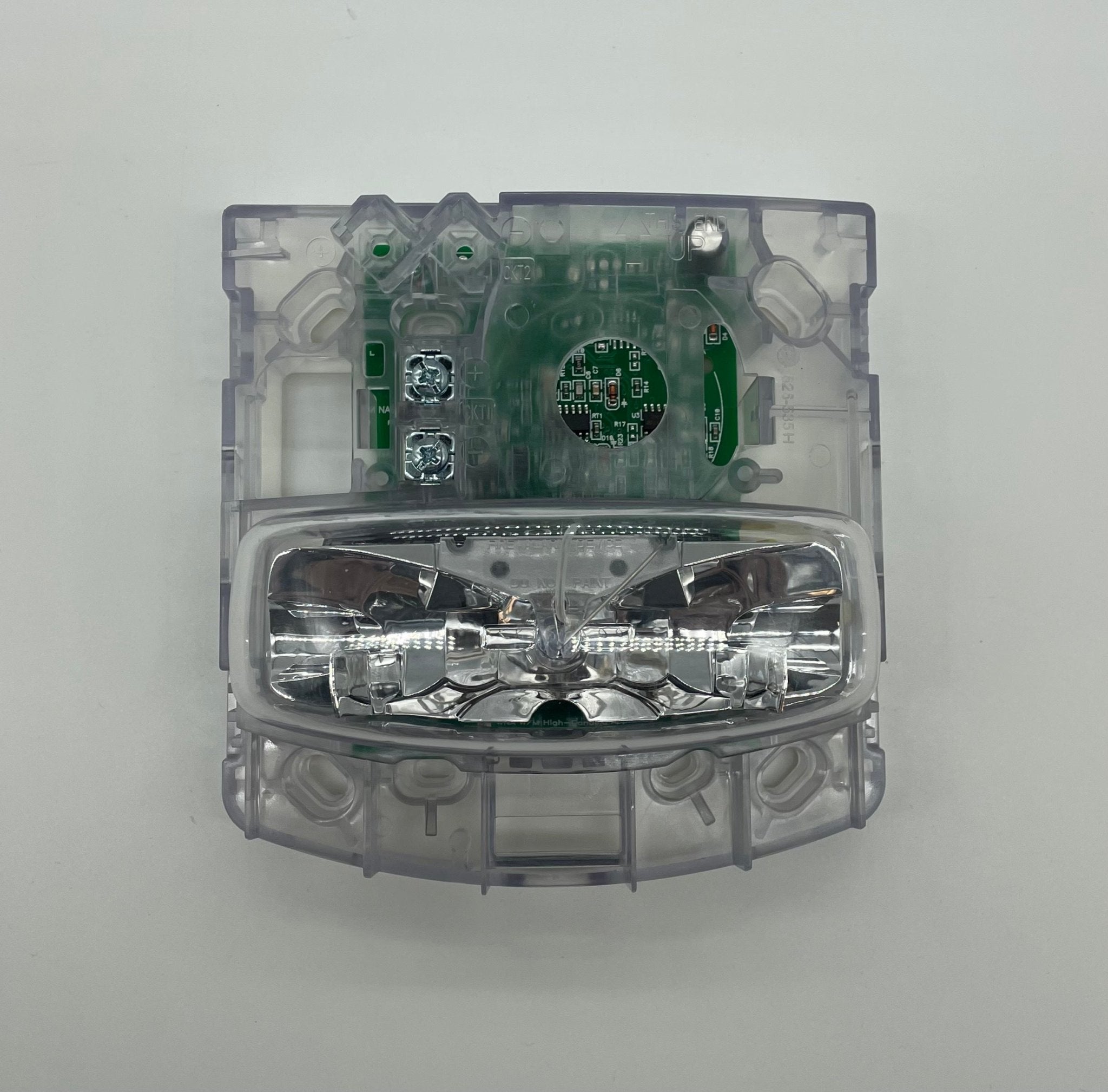 Simplex 4906-9111 fire alarm with white plastic casing and mounting bracket, designed for building safety systems.