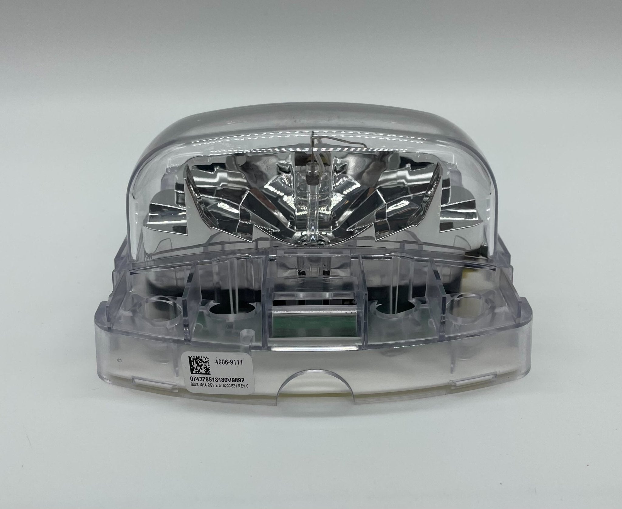 Simplex 4906-9111 fire alarm device with a white plastic cover and mounting bracket, designed for building safety systems