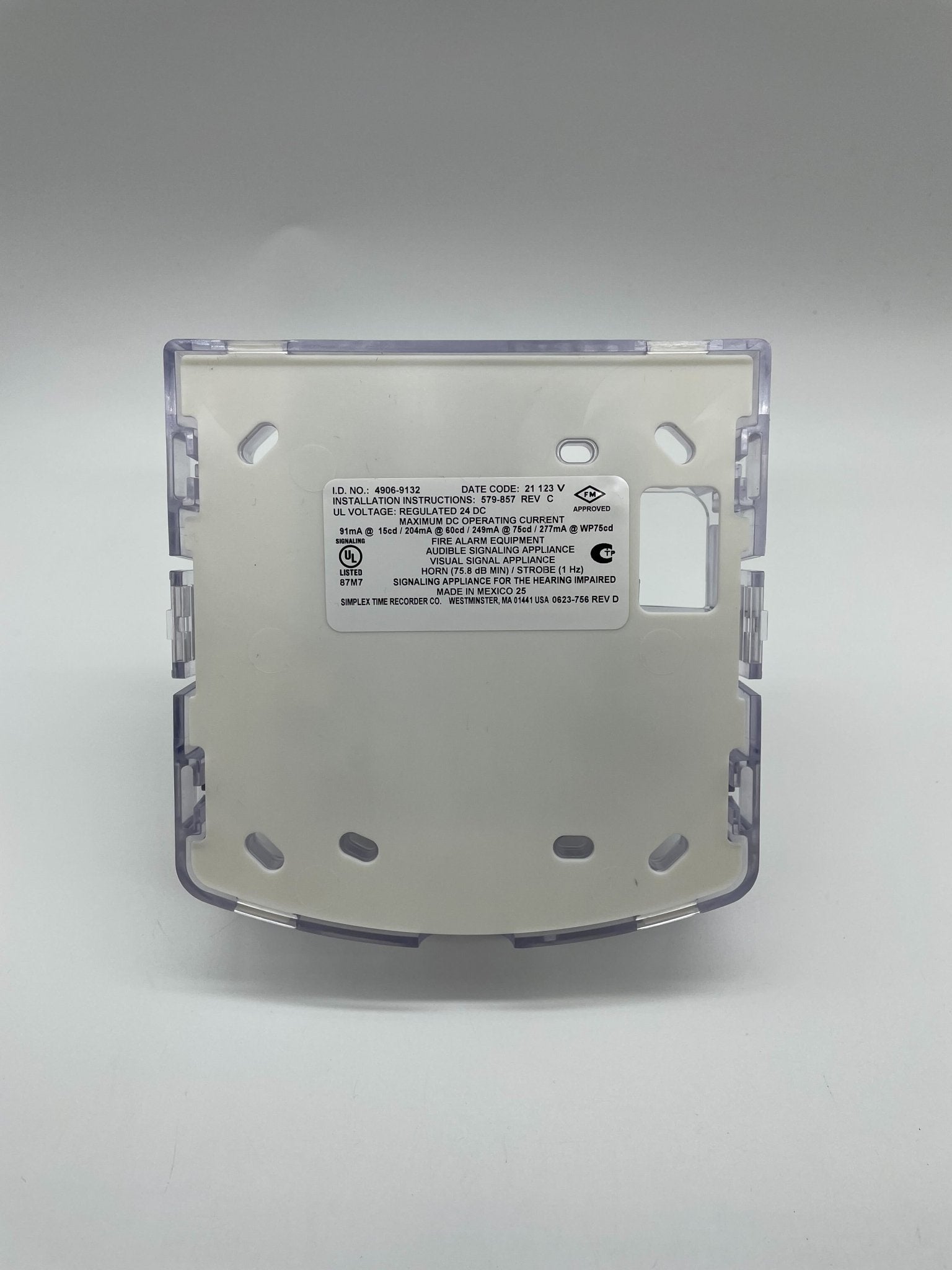 Simplex 4906-9132 horn strobe alarm device with red housing and clear lens, mounted on a wall.