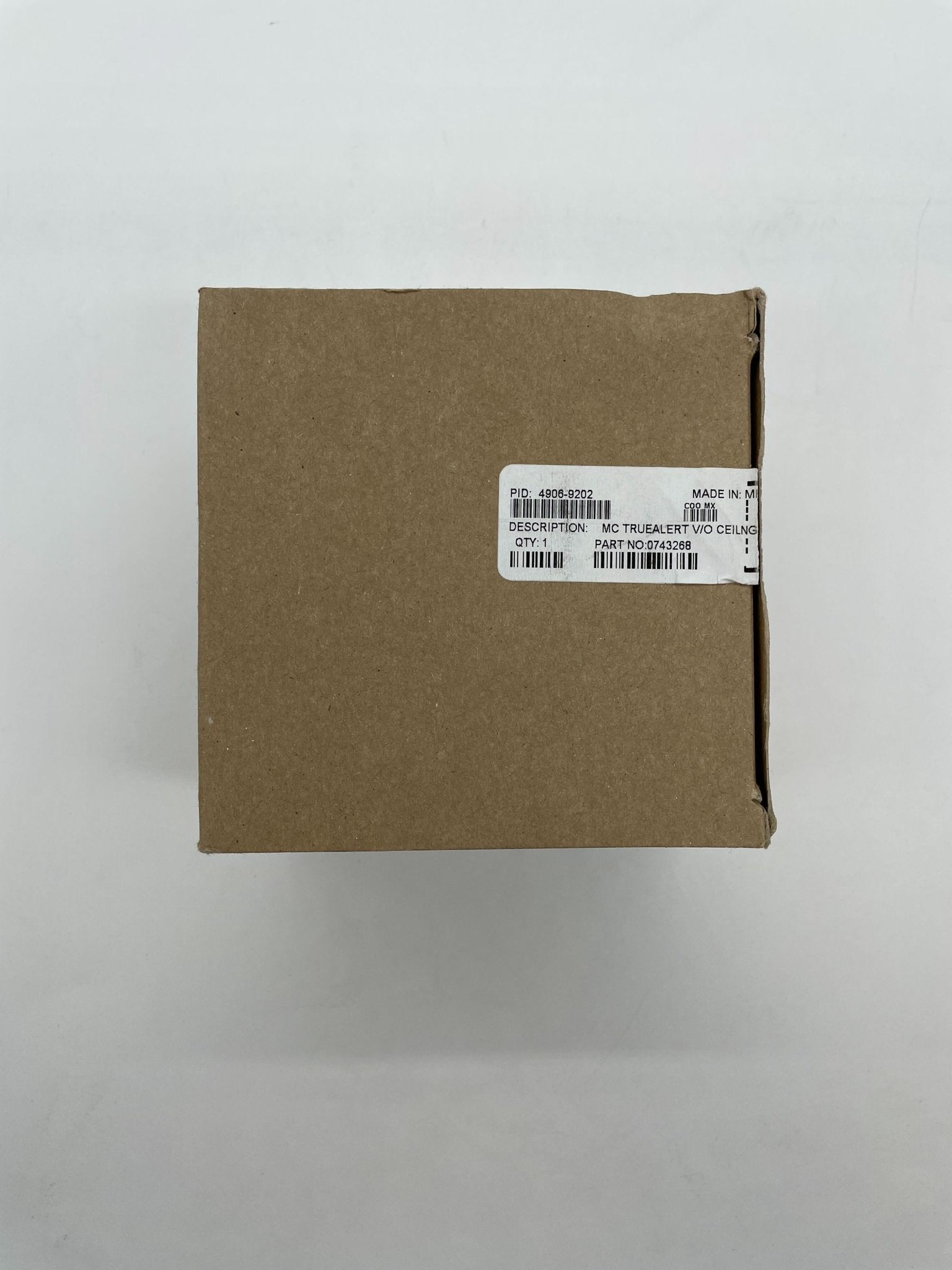 Simplex 4906-9202 strobe light with clear lens and mounting bracket, designed for emergency signaling and safety applications.