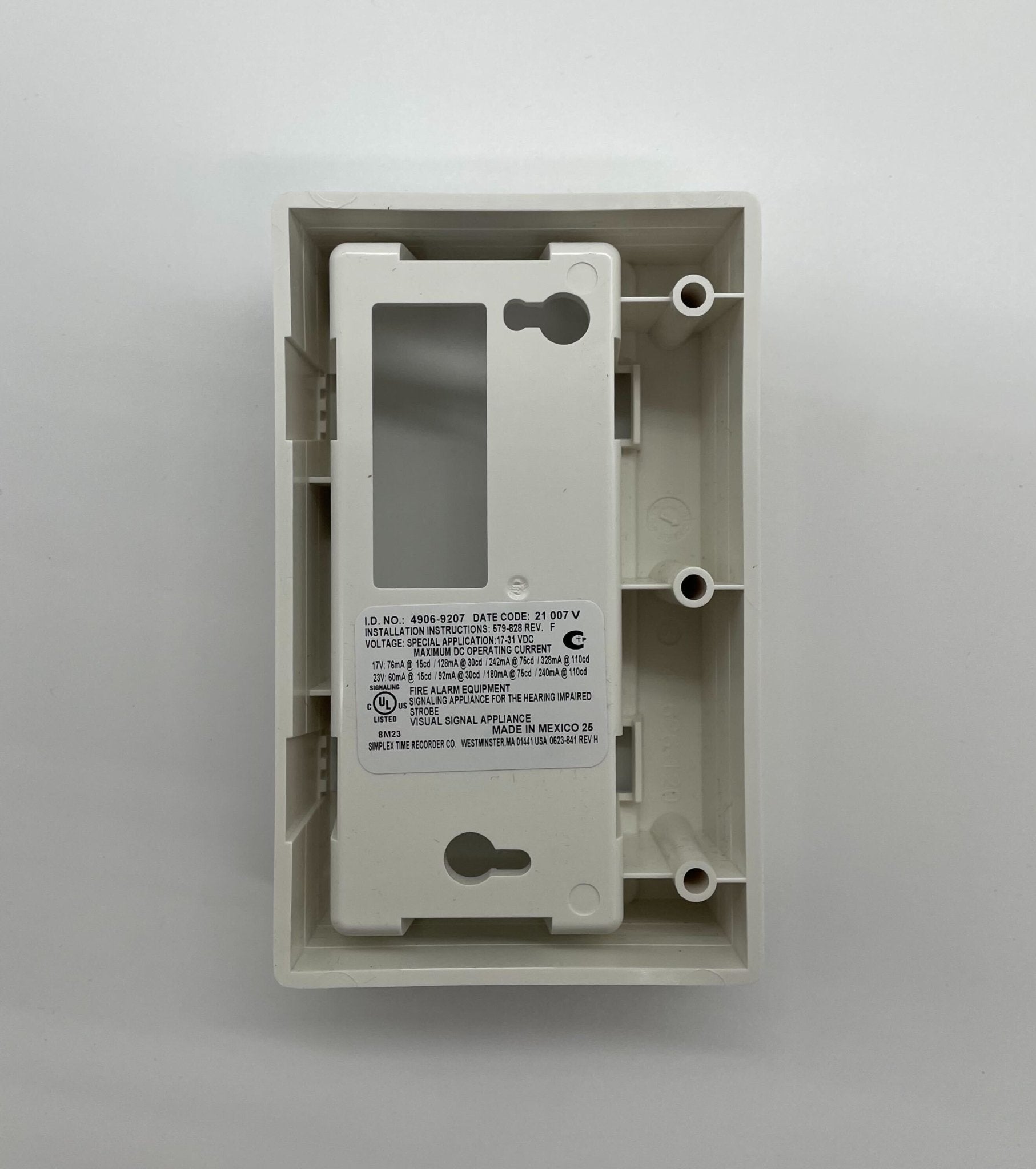 Simplex 4906-9207 fire alarm device mounted on wall, part of Simplex fire alarm system for fire detection and safety.