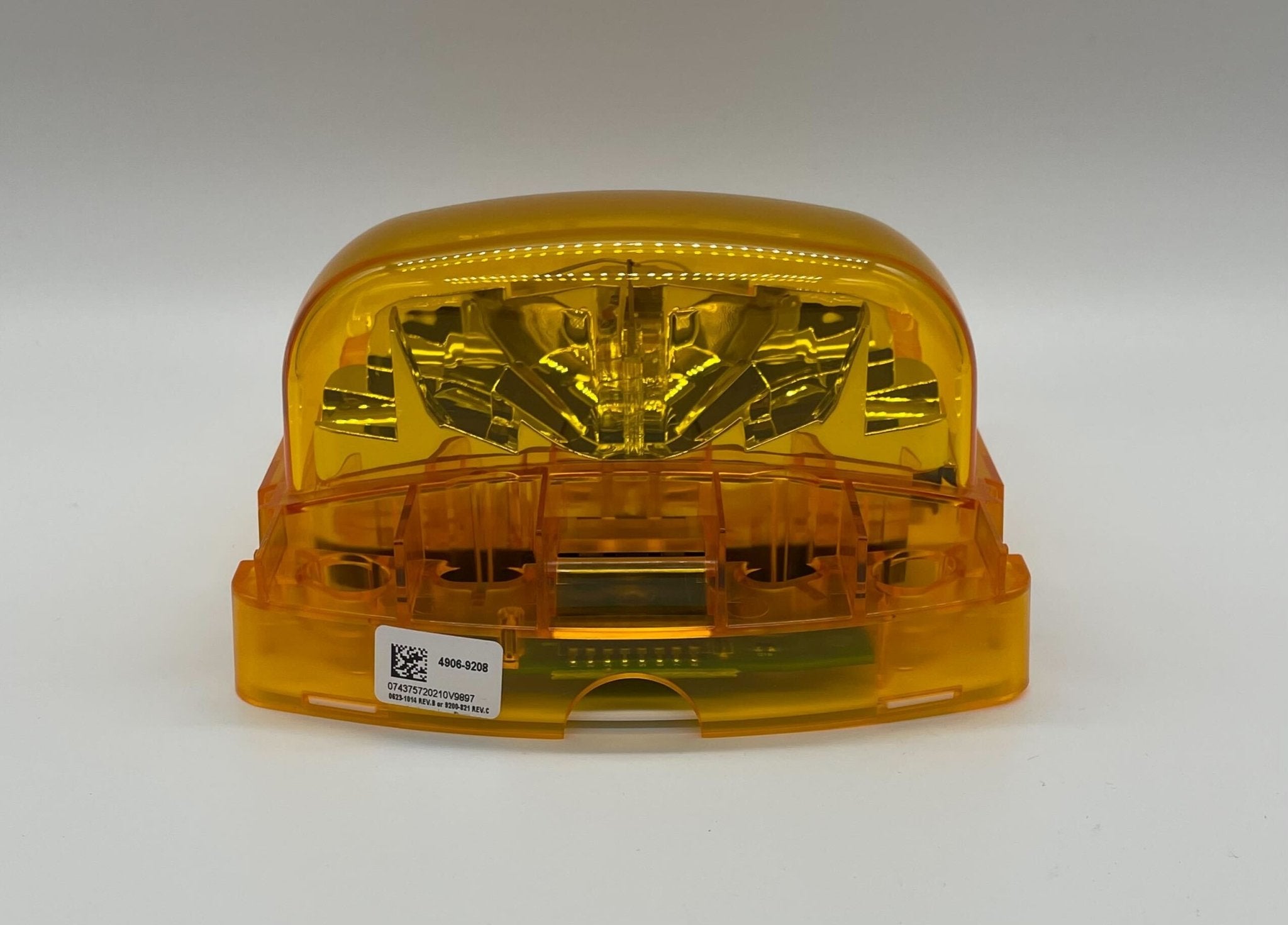 Simplex 4906-9208 fire alarm with white plastic casing, mounted on wall, designed for fire detection and safety.