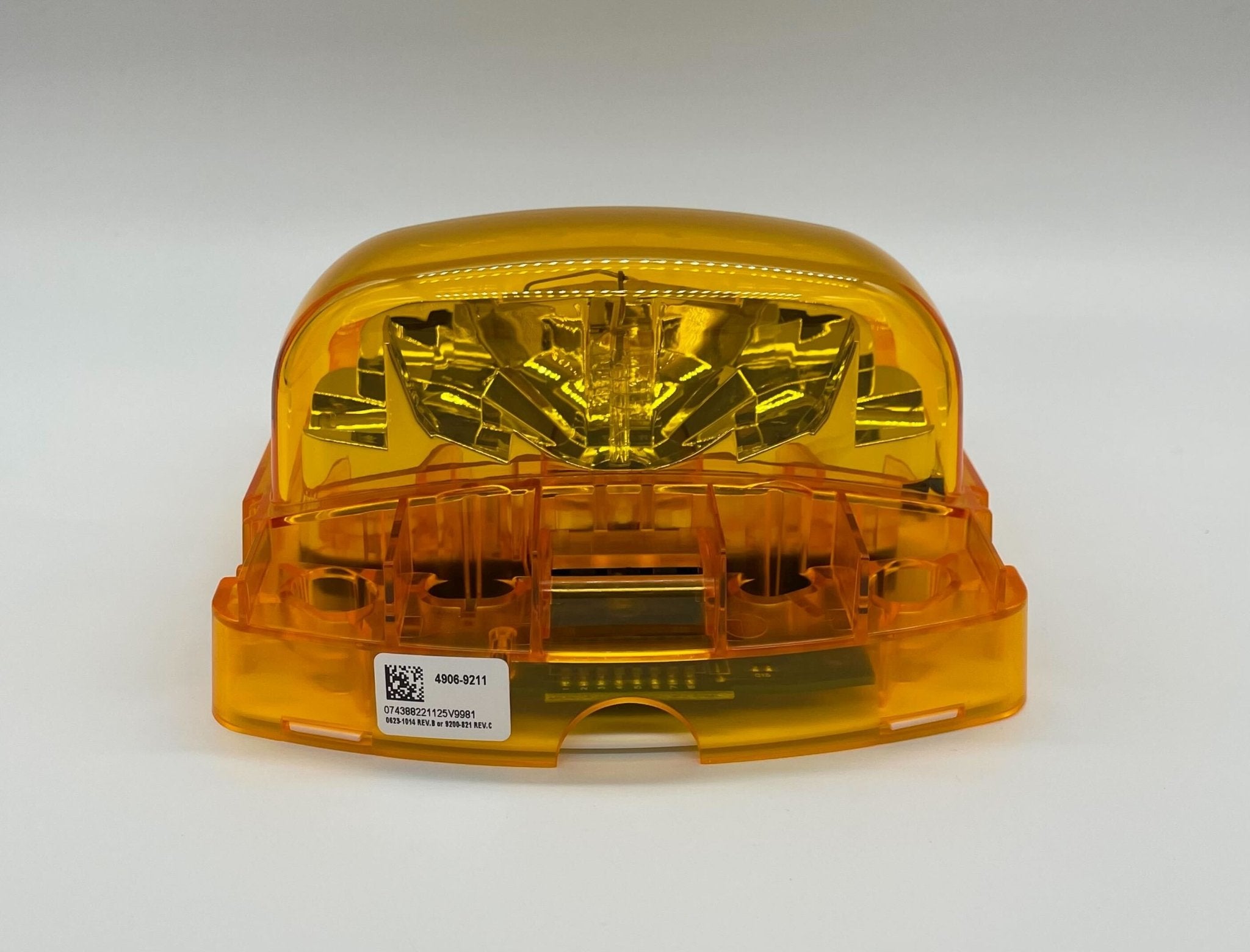 Simplex 4906-9211 fire alarm with white plastic casing and mounting bracket, designed for fire detection and safety.