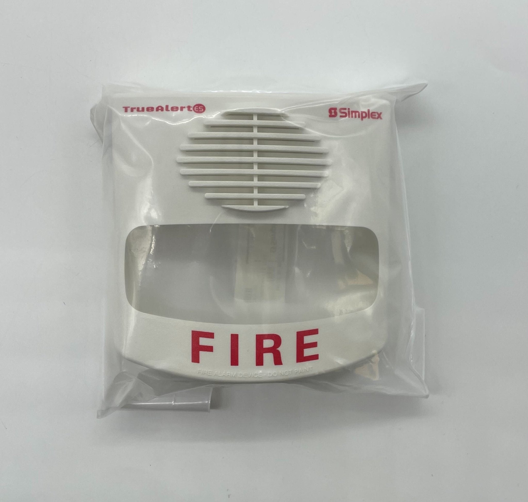 Simplex 49AVC-WWFIRE cover, durable protective cover for fire safety equipment, by Simplex, shown on a fire safety device.