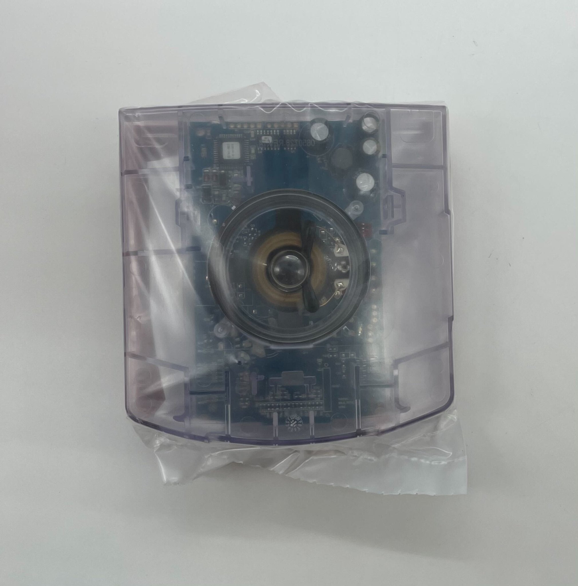 Simplex 49CMT-WRF fire alarm with wireless communication system, mounted on a wall, in a commercial or industrial setting.