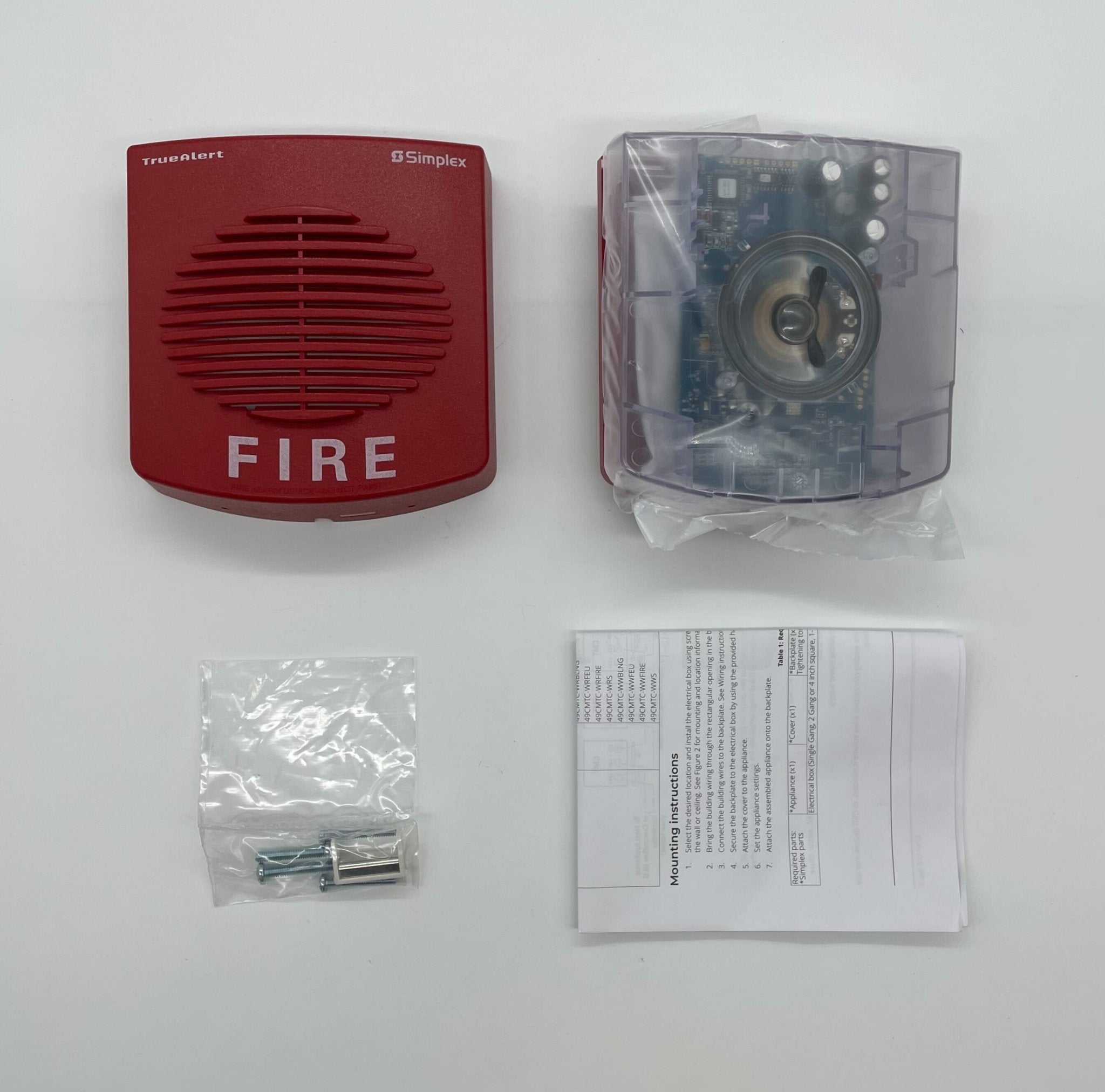 Simplex 49CMT-WRF fire alarm system with wireless communication, mounted on a wall in a building setting.