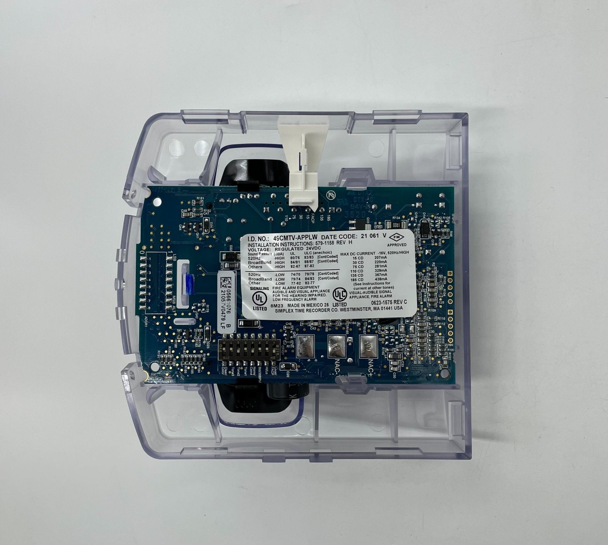 Simplex 49CMTV-APPLW strobe light with amber lens, mounted on a white background for emergency signaling or warning use.