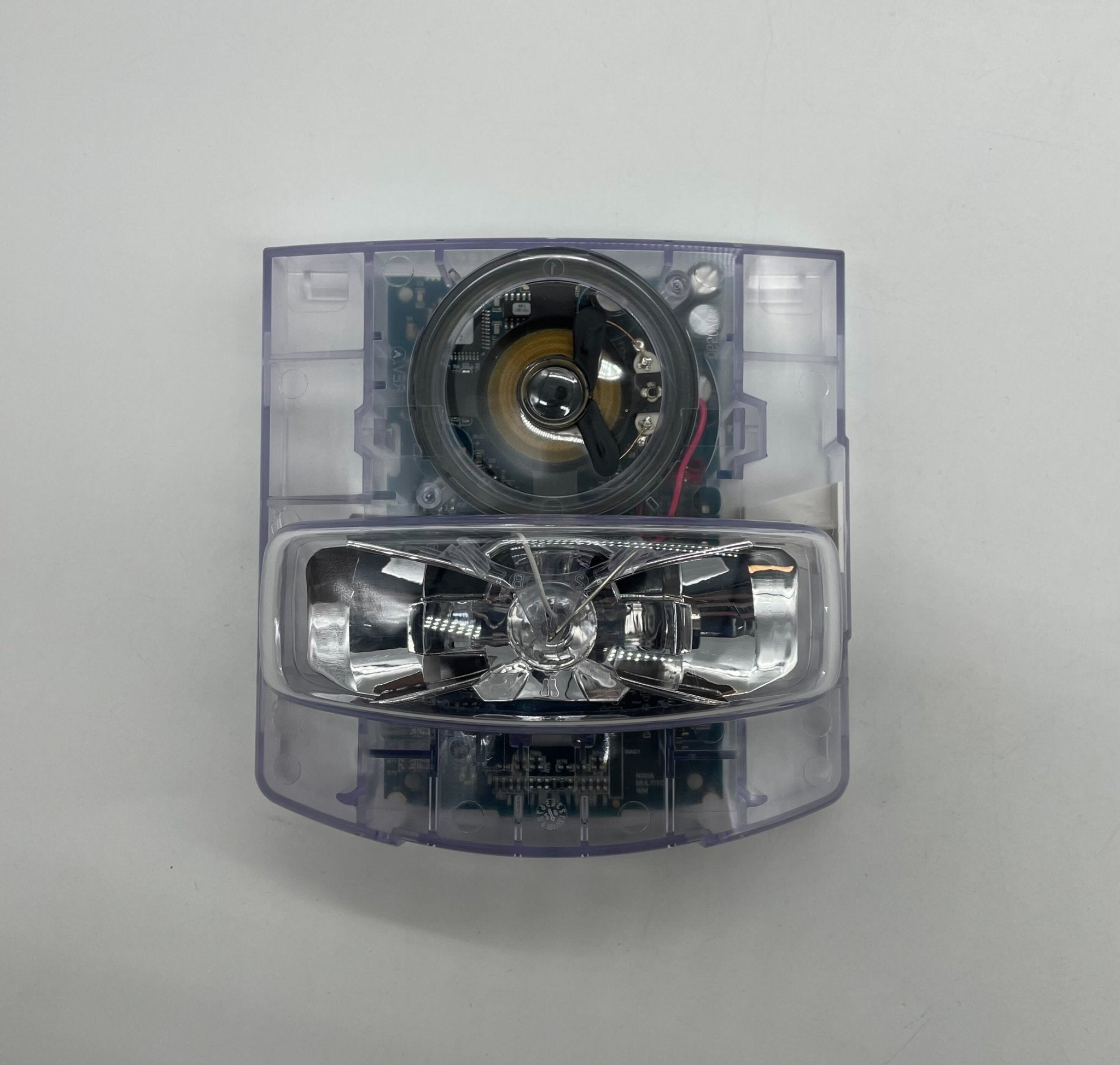 Simplex 49CMTV-APPLW strobe light with orange cover, designed for emergency signaling and visual alert systems.