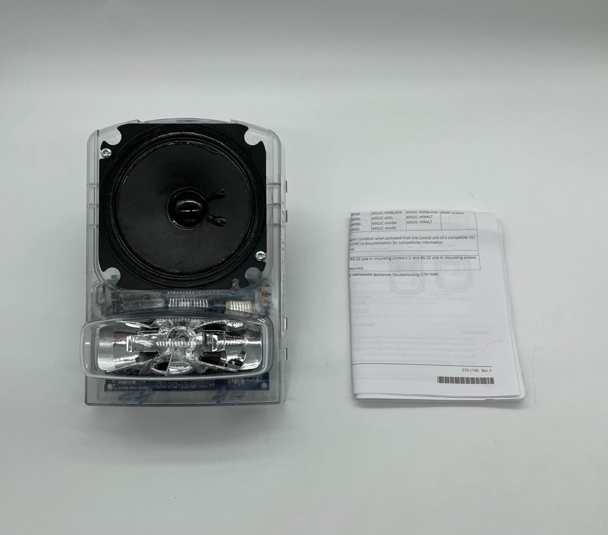 Simplex 49HFV-APPLW speaker strobe light with white cover and mounting hardware, designed for fire alarm systems.