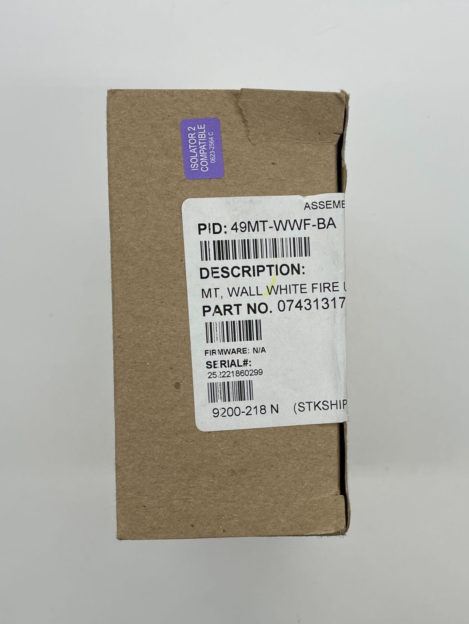 Simplex 49MT-WWF-BA fire alarm with white cover, mounted on wall, featuring digital display and warning indicators.