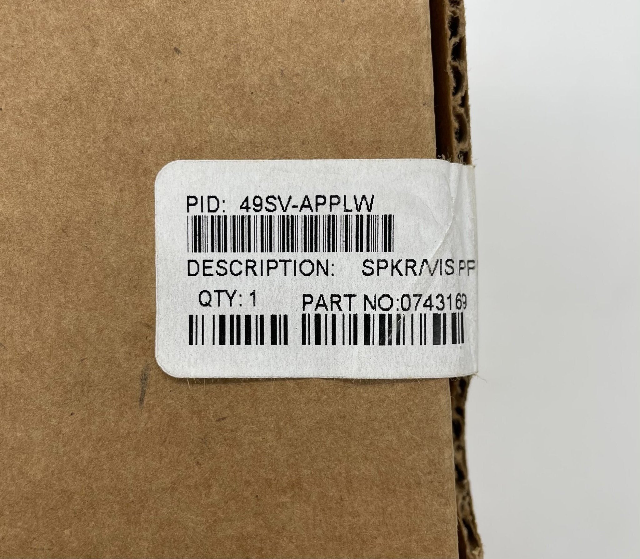 Simplex 49SV-APPLW speaker strobe light with white cover, used for visual alert signaling in security systems.