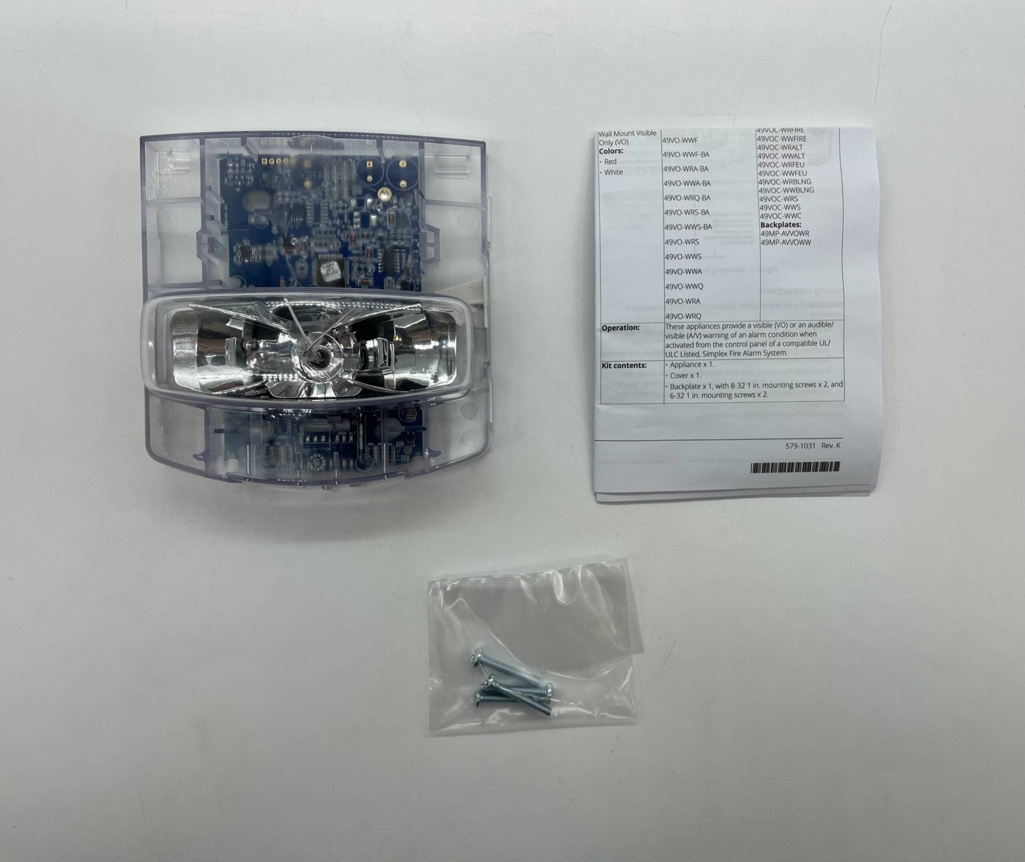 Simplex 49VO-APPLW horn strobe alarm device with white cover, mounted on wall, for emergency alert signaling.