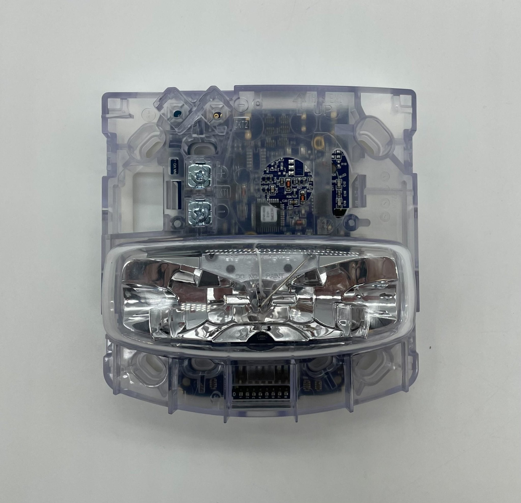 Simplex 49VO-WRSO strobe light, mounted on a fixture, with clear lens and wiring, used for warning and signaling applications.