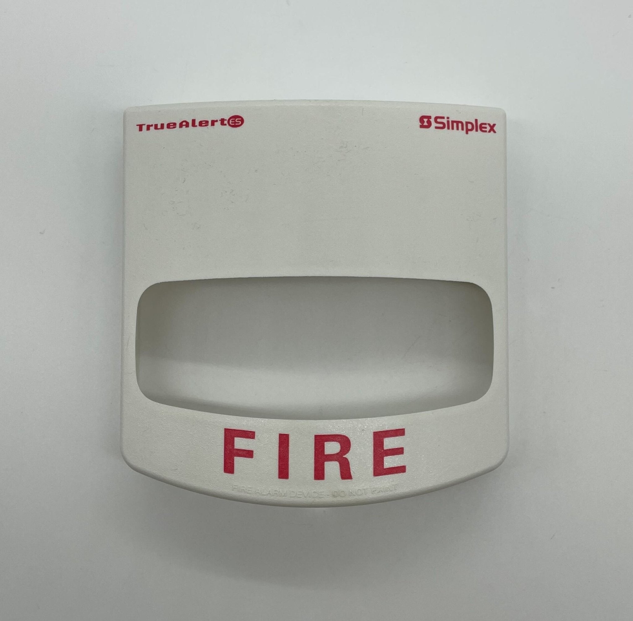 Simplex 49VO-WWF strobe light, a bright warning flashing device from Simplex, mounted on a wall with visible wiring and mounting hardware.