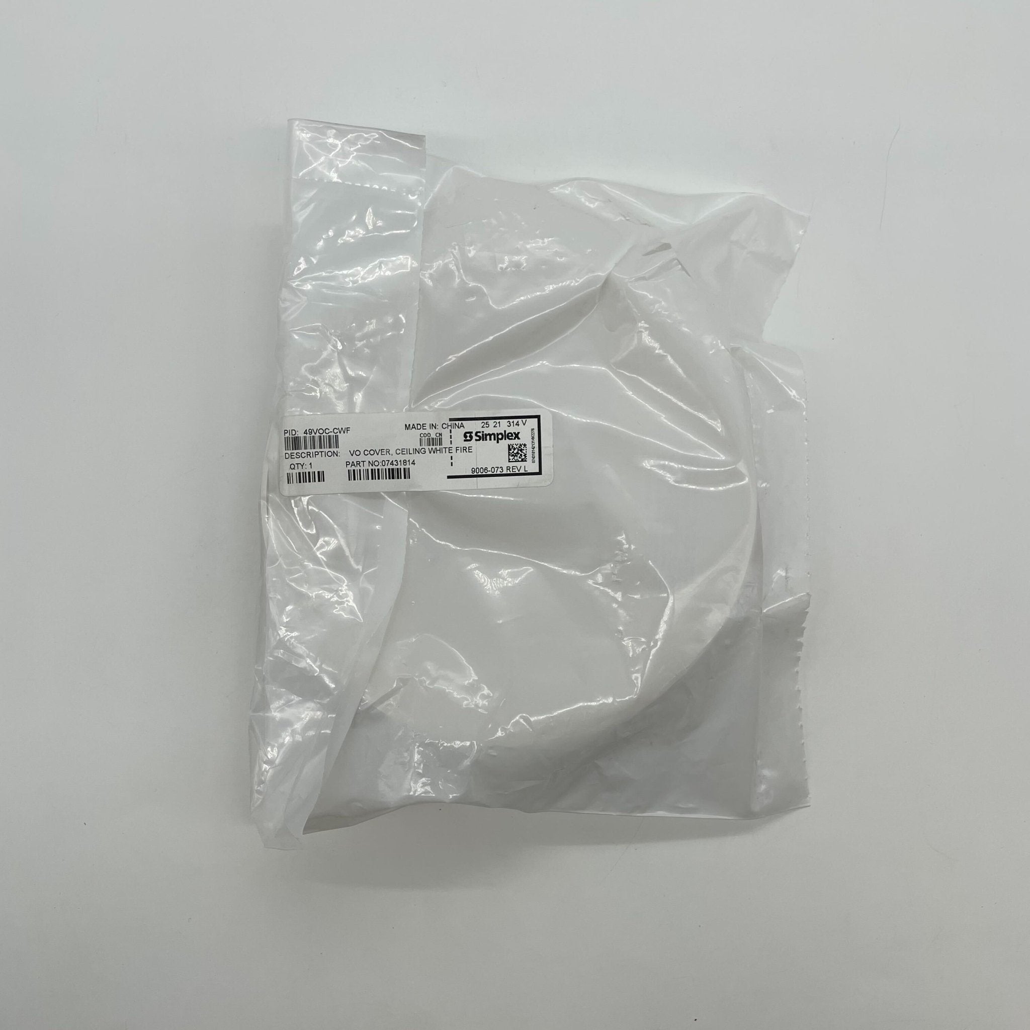 Simplex 49VOC-CWF cover by Simplex, shown in a natural outdoor setting, designed to protect equipment from environmental elements.