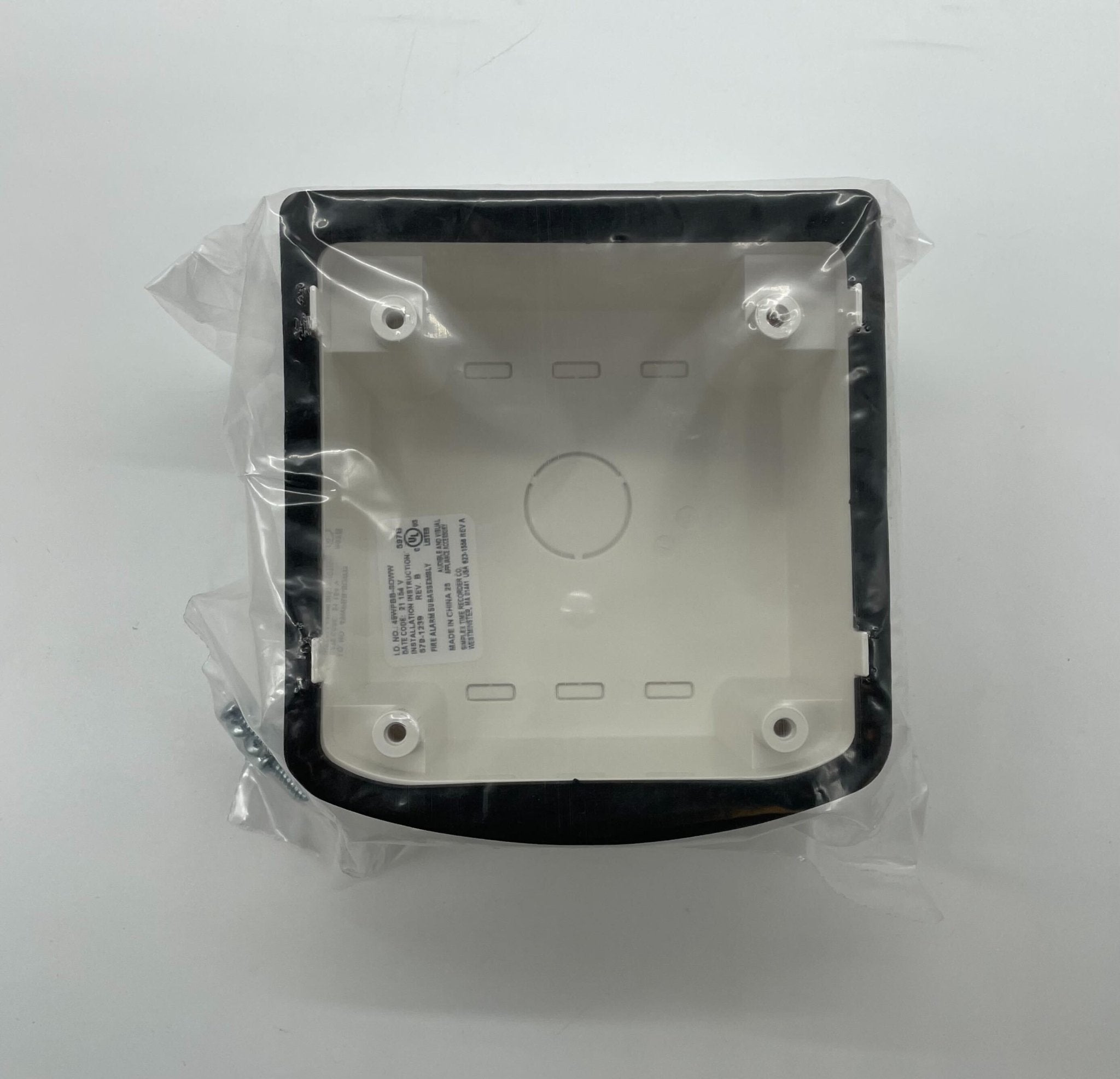Simplex 49WPBB-SOWW fire alarm with white plastic cover and siren, designed for emergency alert systems.