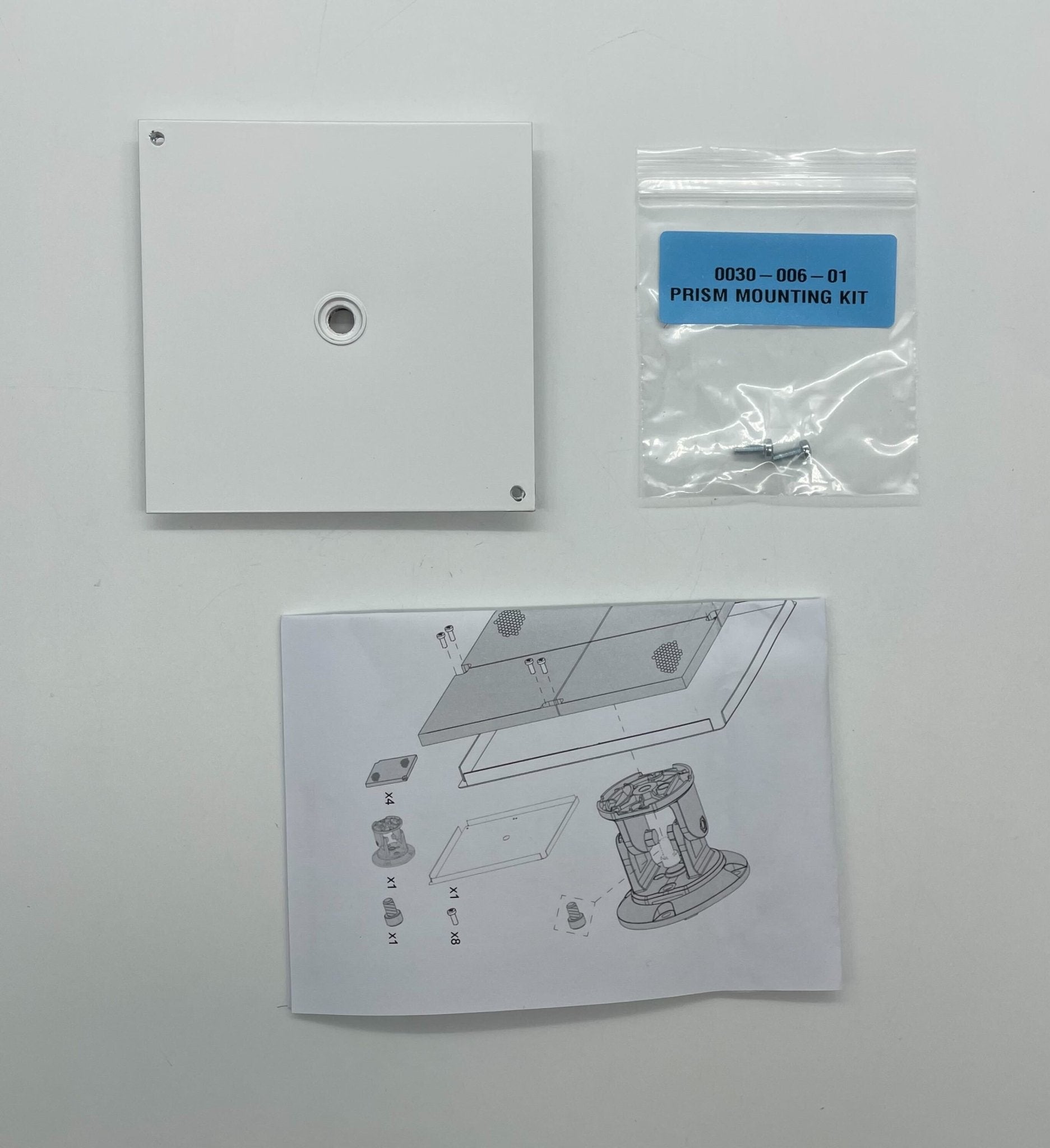 Simplex 5000-008 fire alarm device, white with test and reset buttons, mounted on a wall for fire safety.