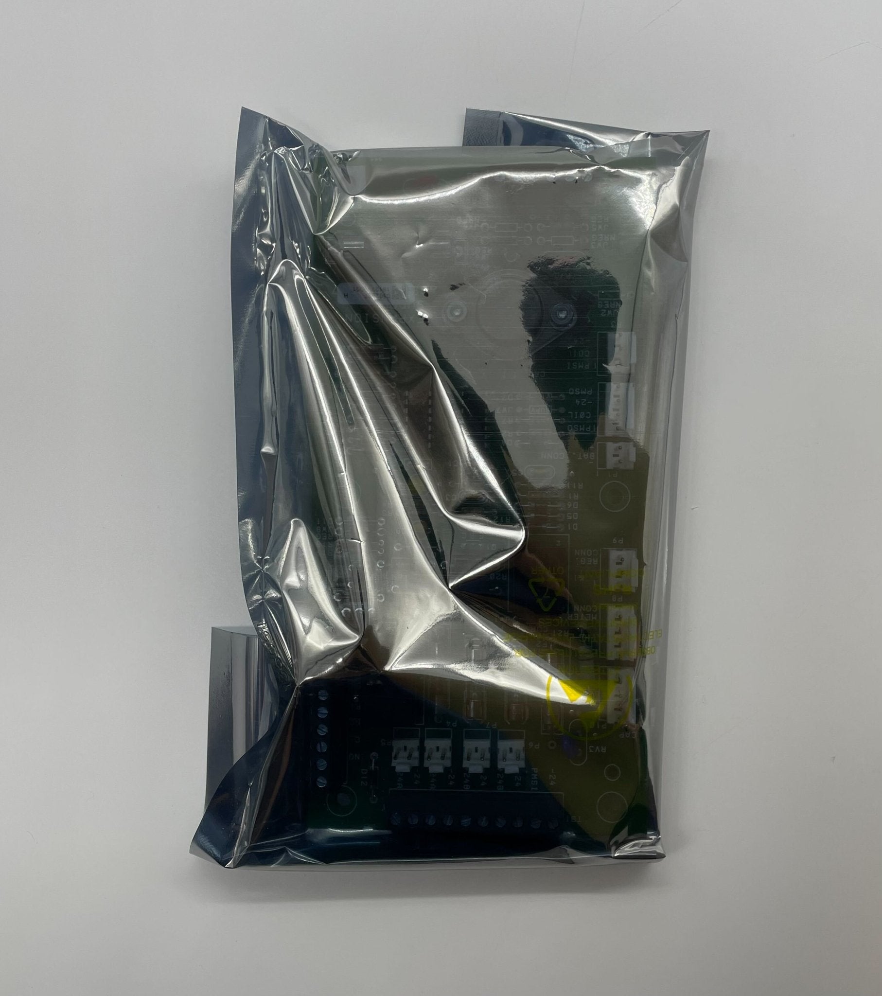 Simplex 562-827 power supply unit with metal casing and connection ports, designed for reliable electrical performance.
