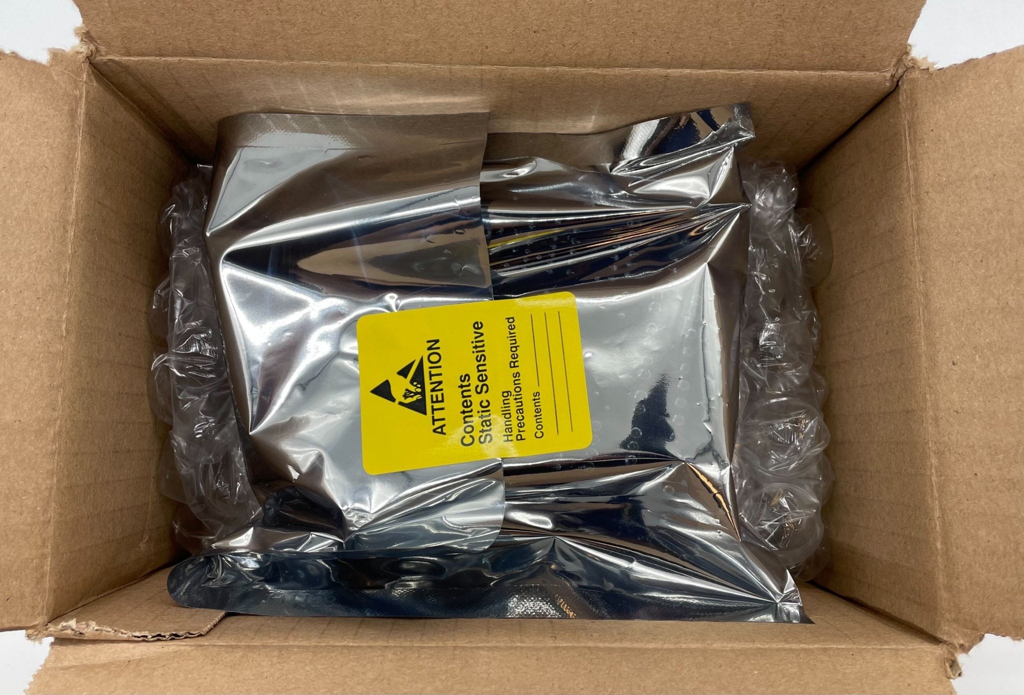 Simplex 565-028 power supply unit with black casing and connected wiring, designed for electrical systems.