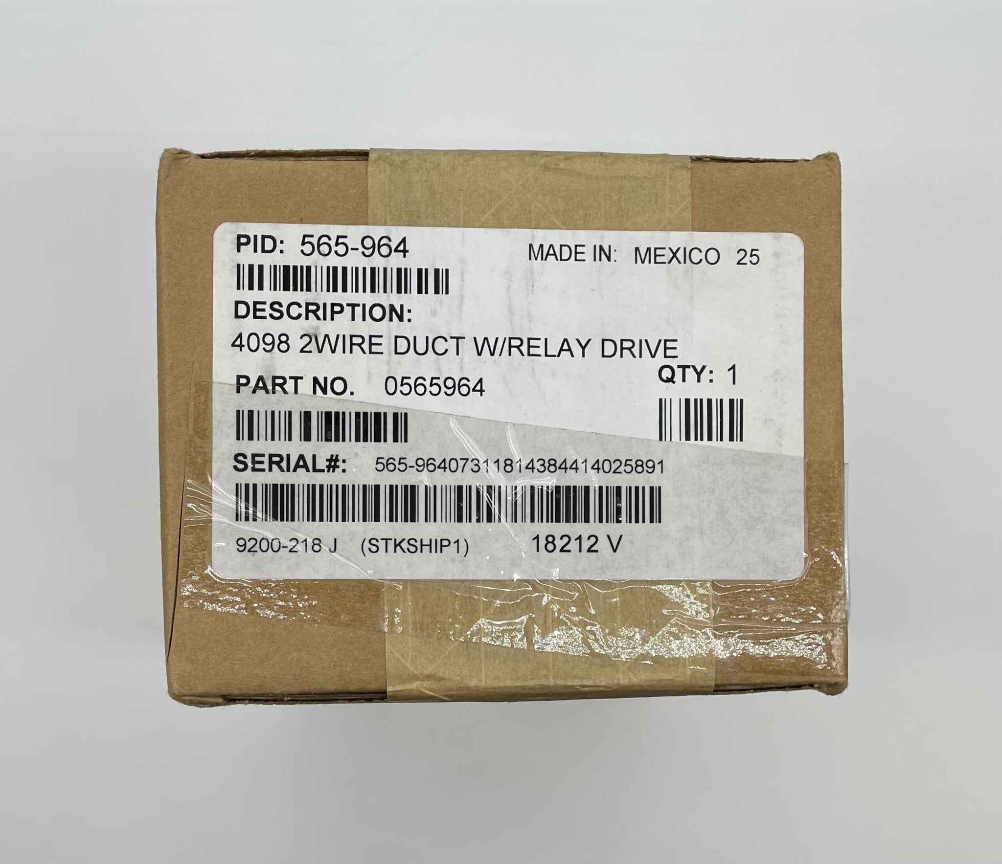 Simplex 565-964 relay from Simplex, shown in a close-up view with metal connectors and plastic housing.