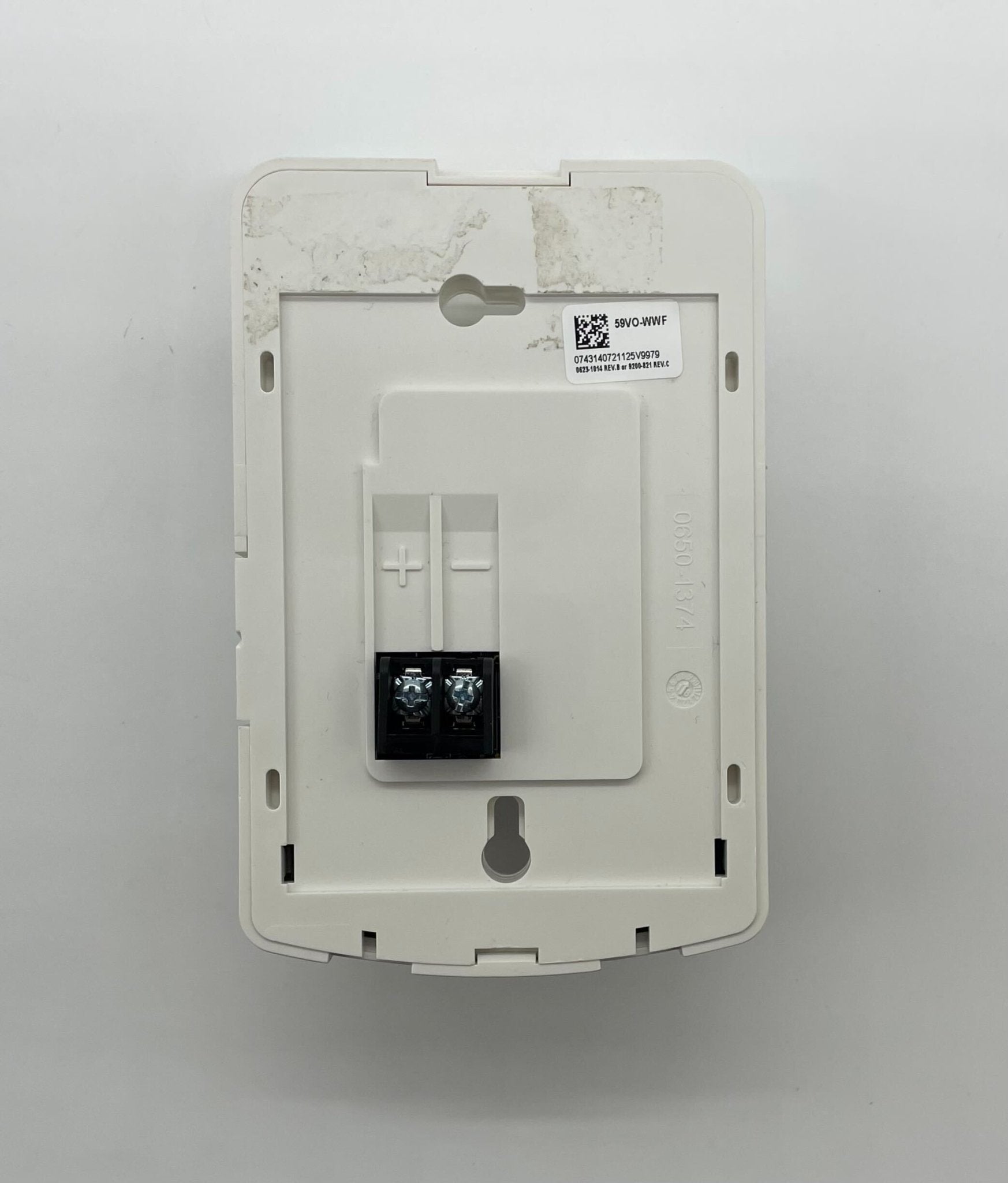 Simplex 59VO-WWF fire alarm with yellow warning label and mounting bracket, designed for building safety and fire detection.