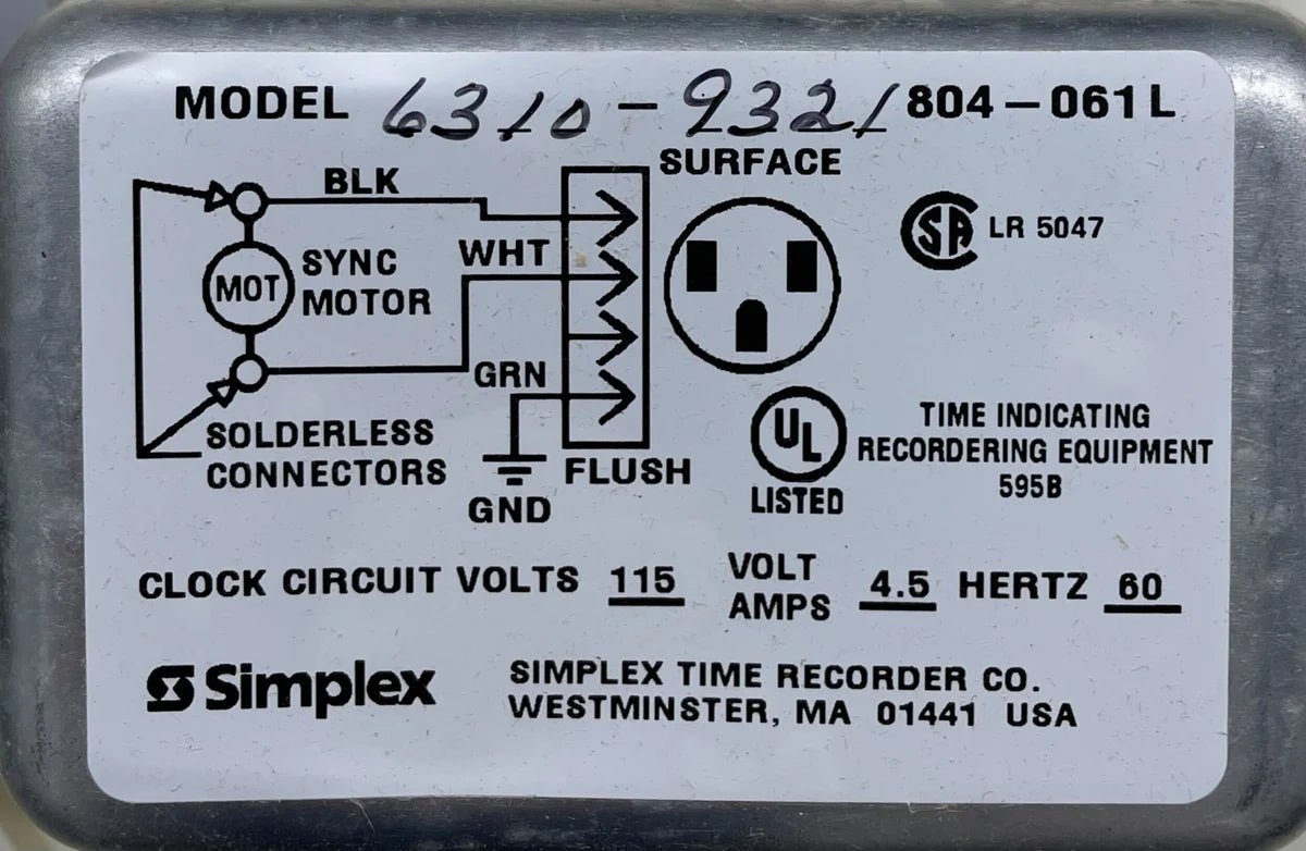 Simplex 6310-9321 fire alarm device with visible wiring and mounting hardware, used for building fire safety systems.