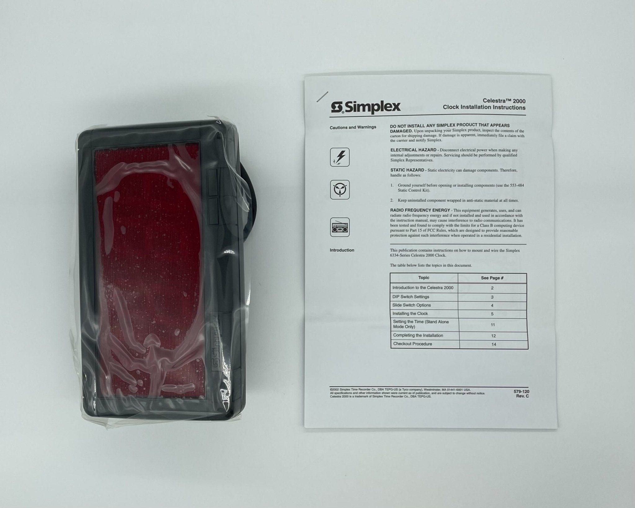 Simplex 6334-9135 fire alarm with digital display, mounted on wall, from Simplex brand, used for fire safety in buildings.