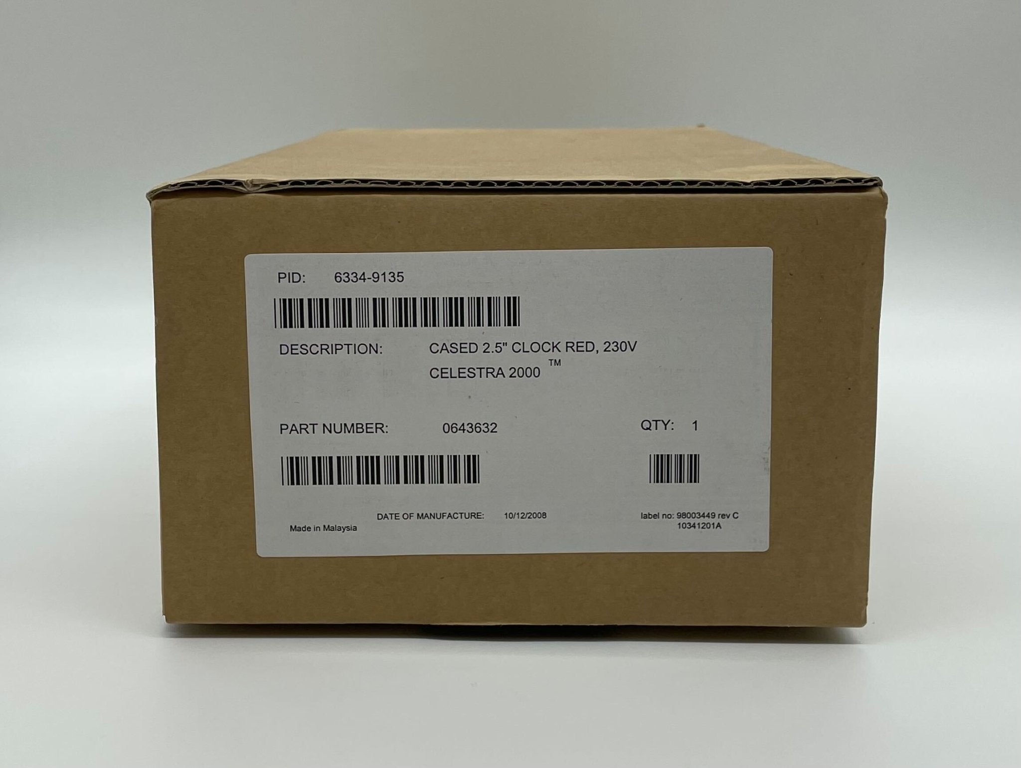 Simplex 6334-9135 fire alarm device with white casing, mounted on wall, used for safety and fire detection.