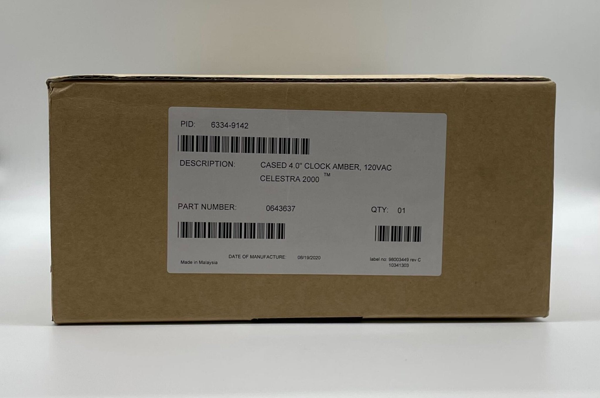 Simplex 6334-9142 fire alarm sensor with white plastic casing, mounted on a wall, designed for fire detection and safety.