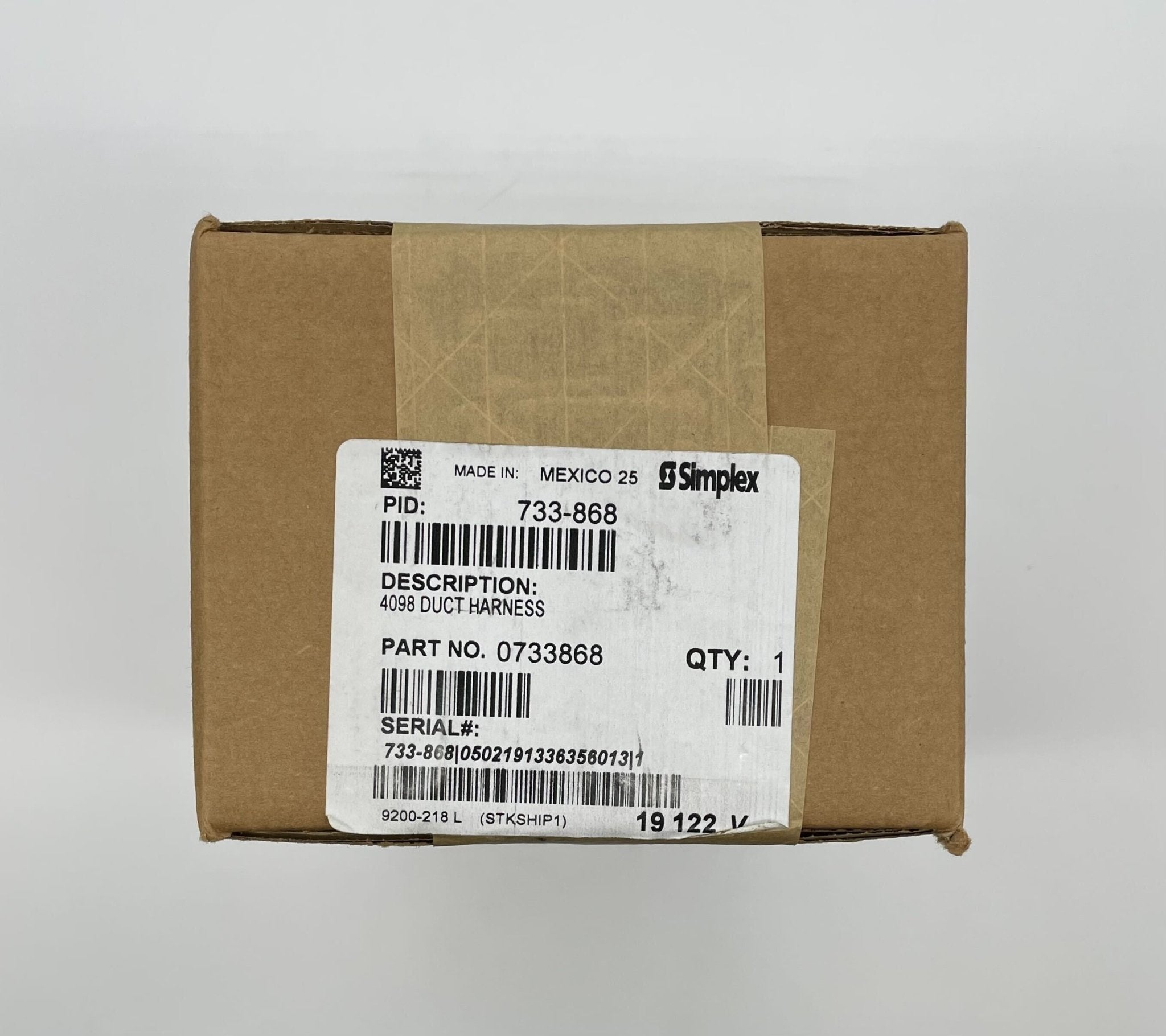 Simplex 733-868 fire alarm device by Simplex, showing the alarm unit with mounting brackets and control features.