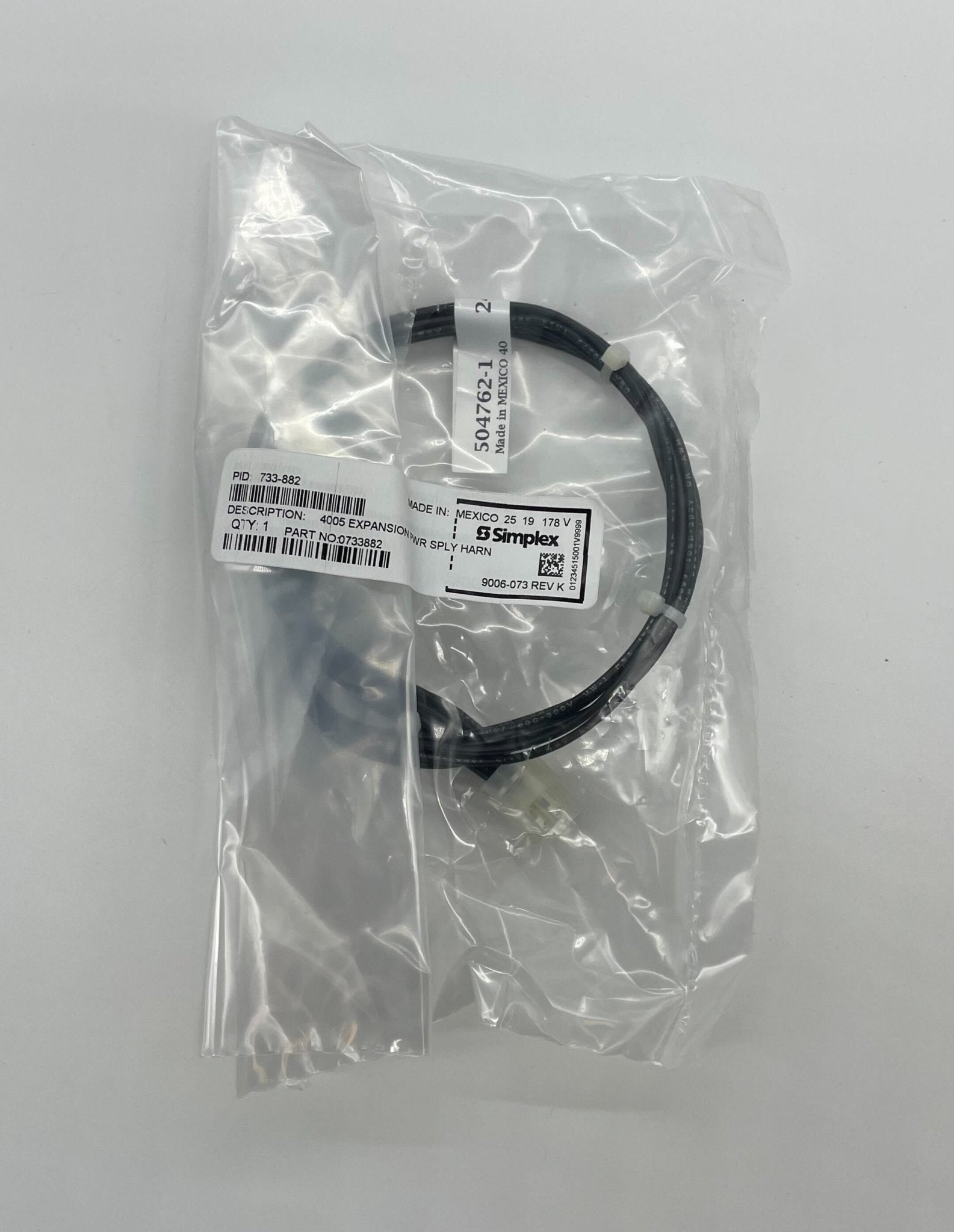 Simplex 733-882 fire alarm by Simplex, showing the alarm unit with mounting features on a white background.