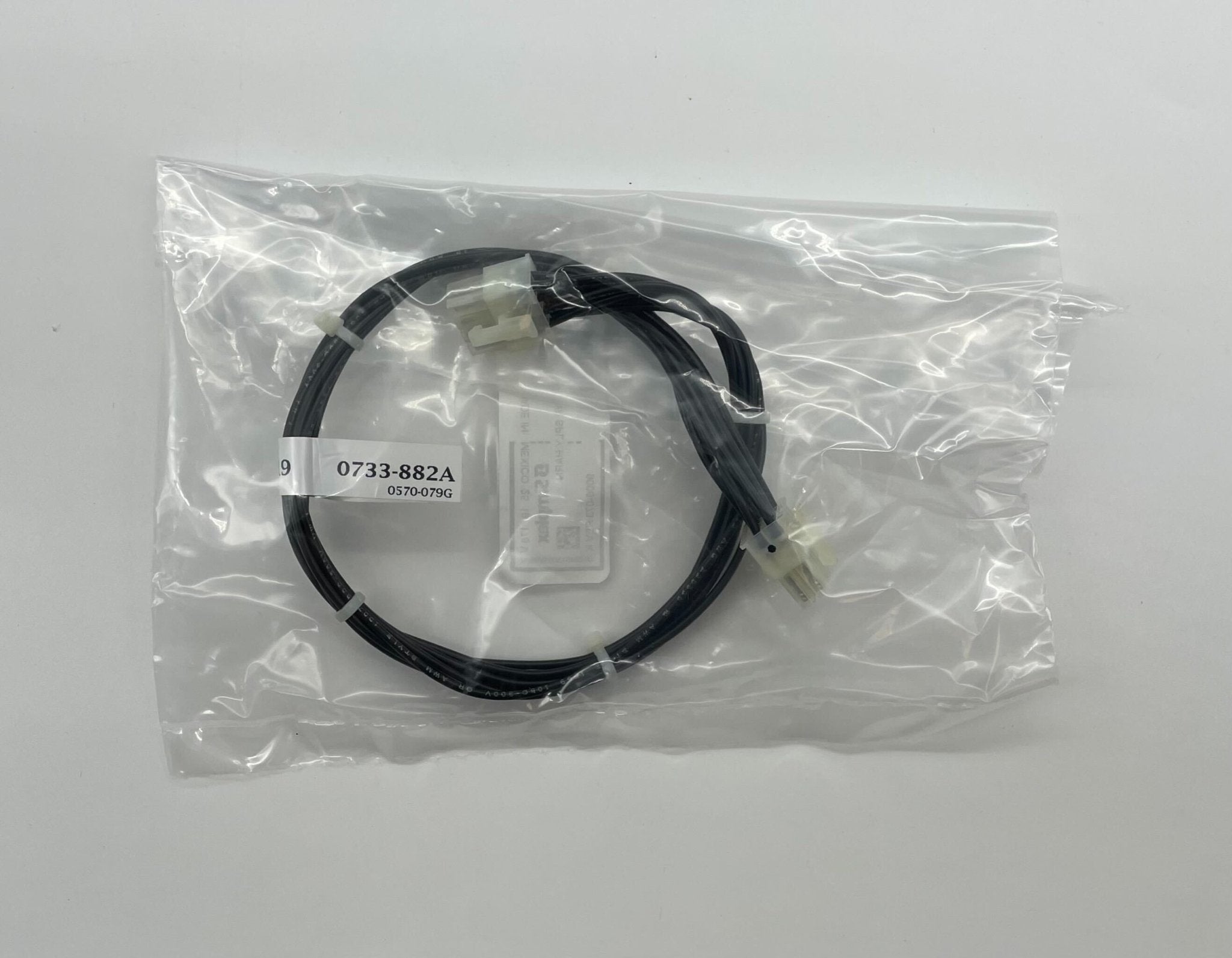 Simplex 733-882 fire alarm system with alarm indicator and wiring, designed for building safety and fire detection.