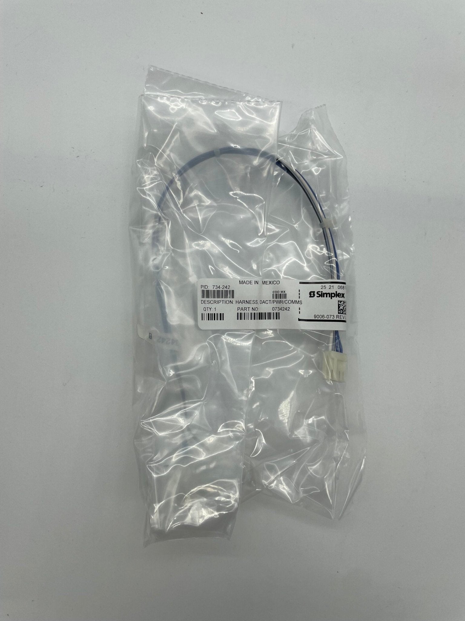 Simplex 734-242 fire alarm device with visible alarm components for fire detection and safety.