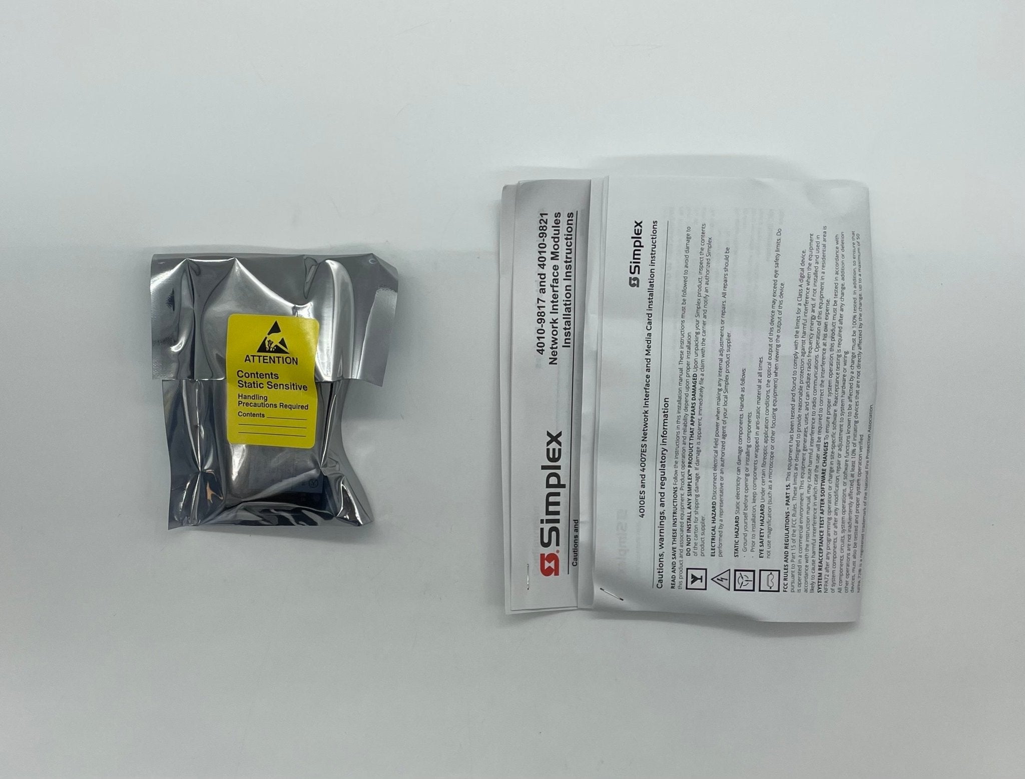 Simplex 742-101 fire alarm device with alarm horn and sensor, designed for fire safety systems.