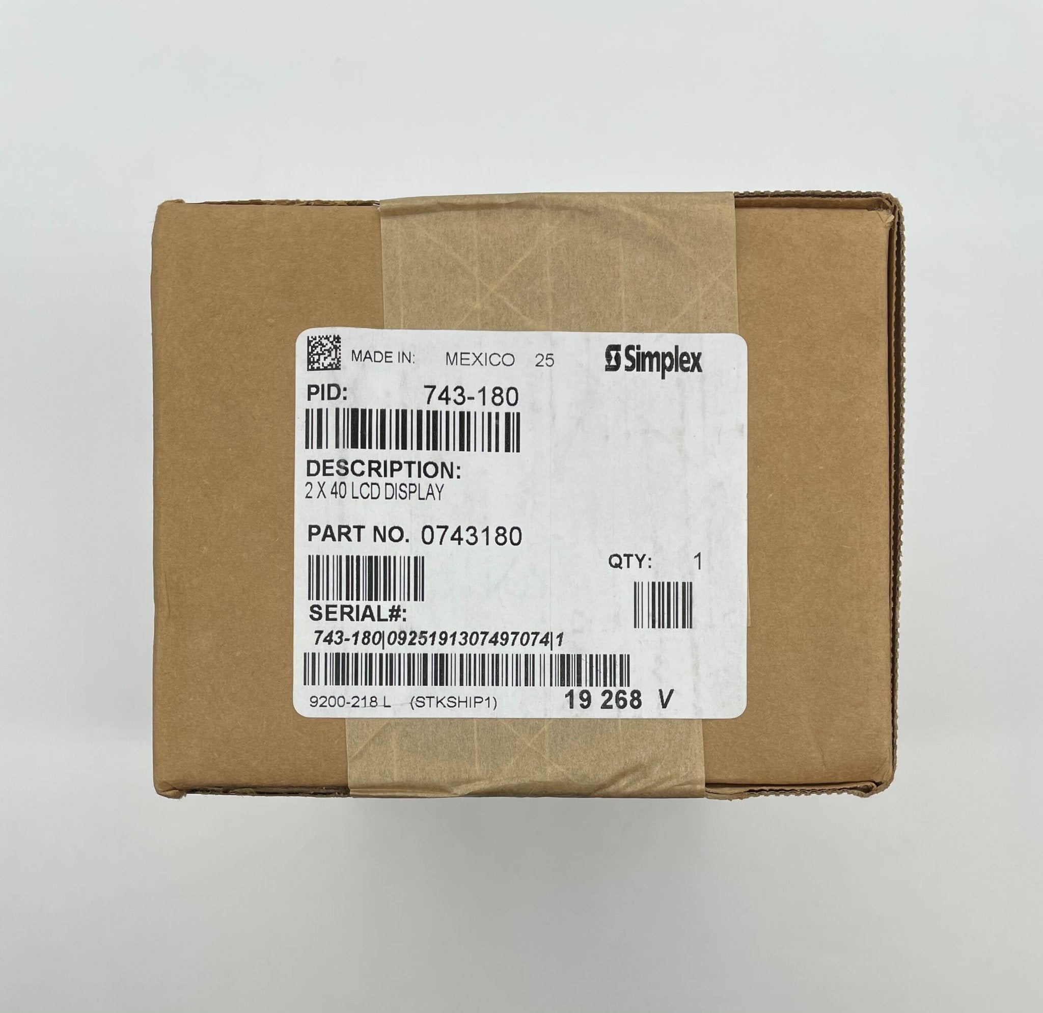 Simplex 743-180 fire alarm device with alarm horn and sensor for fire safety detection, manufactured by Simplex.