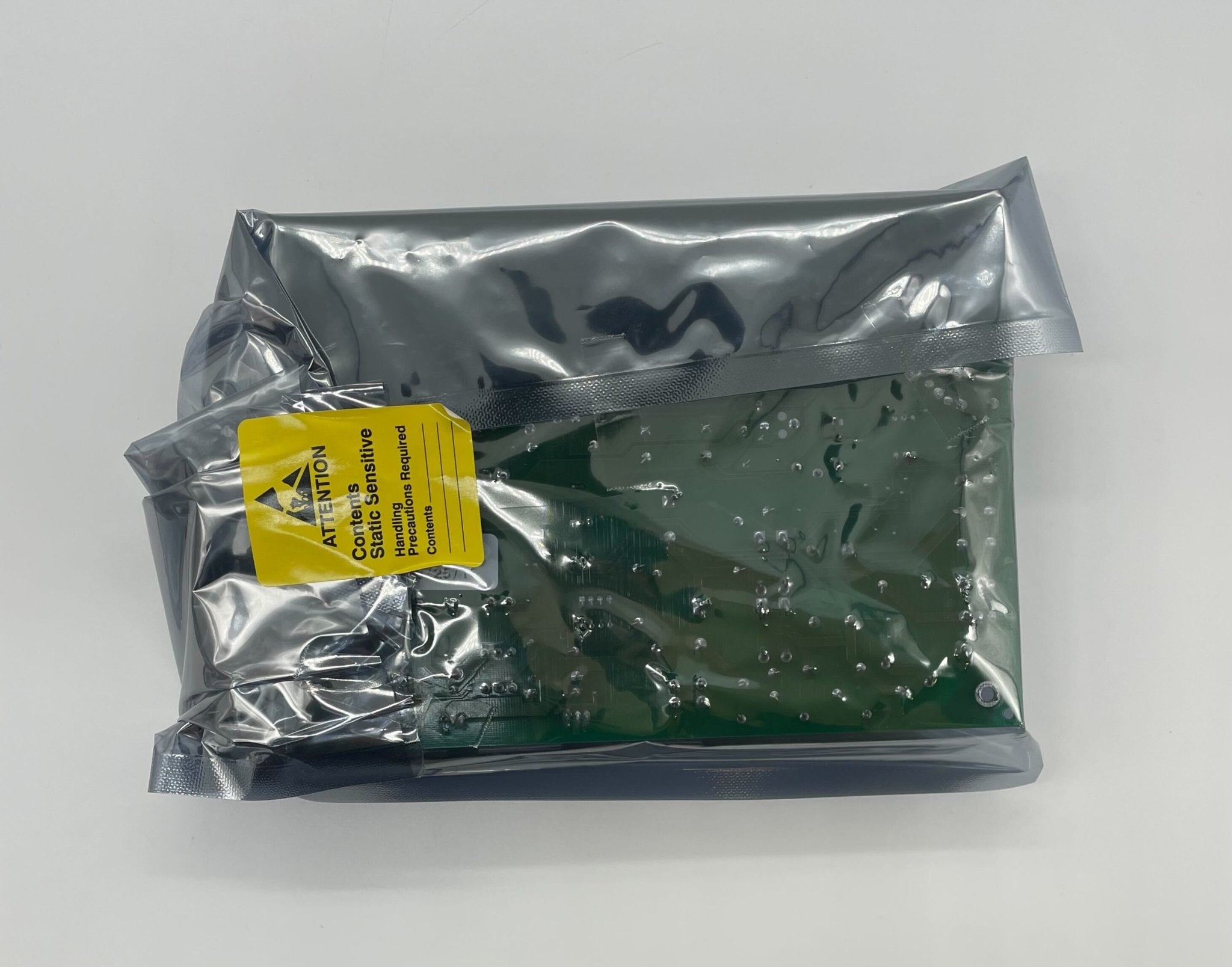Simplex 8565-479 power supply by Simplex, showing the compact industrial power supply unit on a white background.