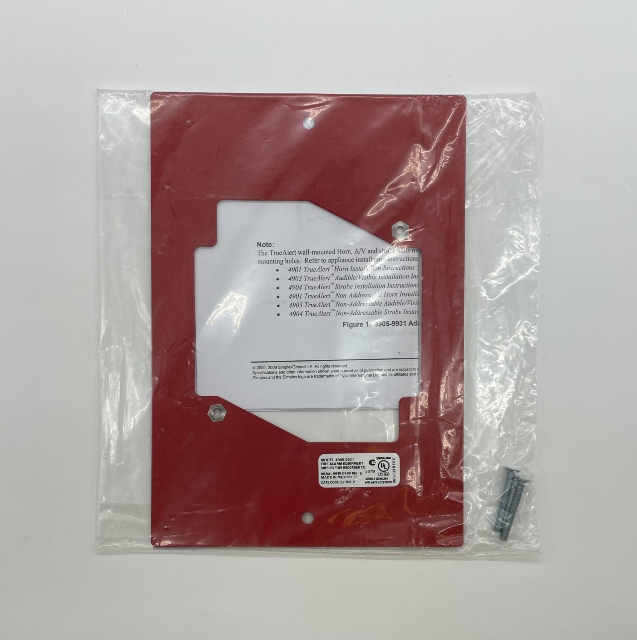 Simplex 4905-9931 fire alarm with white plastic casing, mounted on wall, part of Simplex fire safety system.